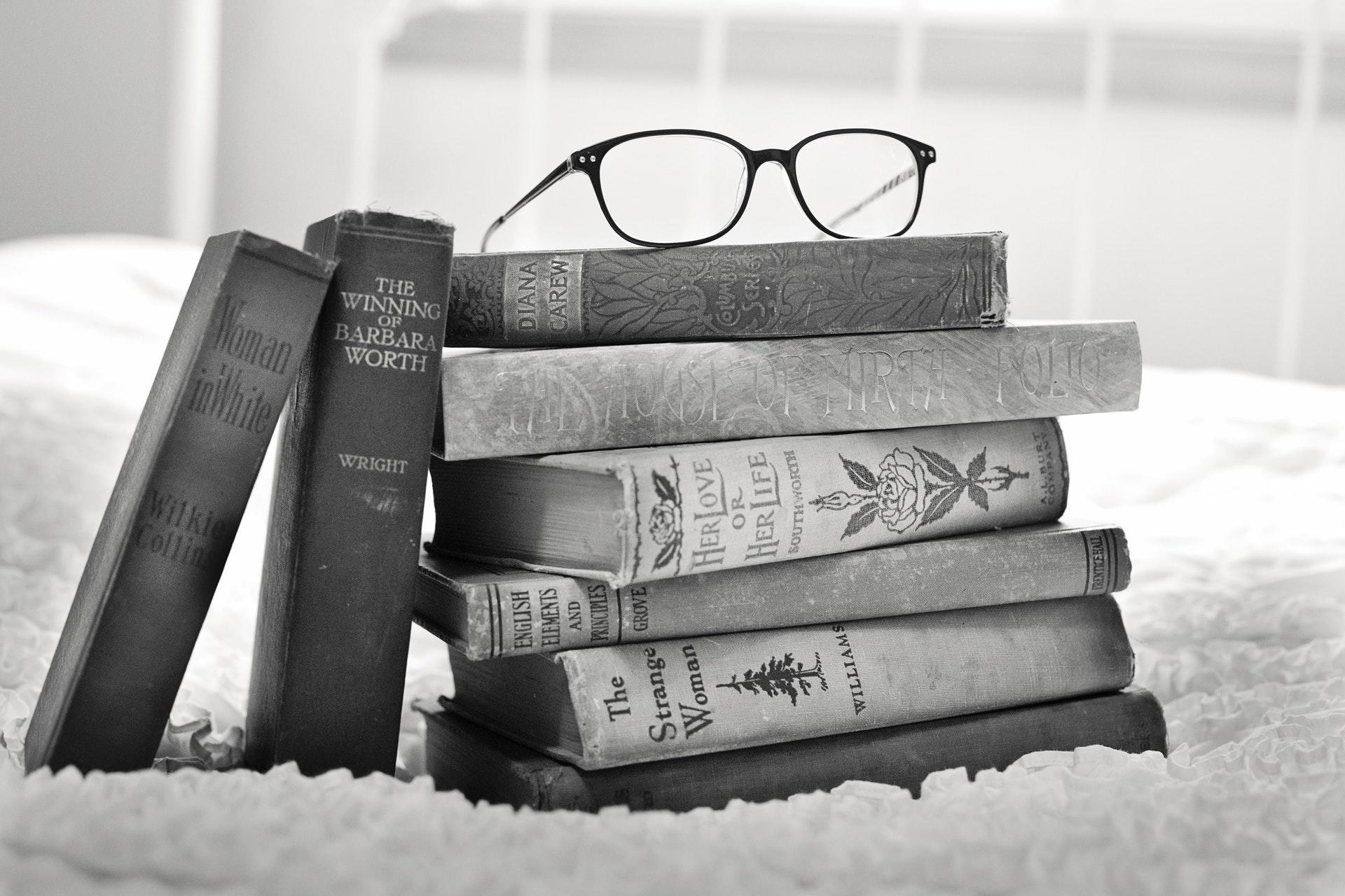 History books and glasses.
