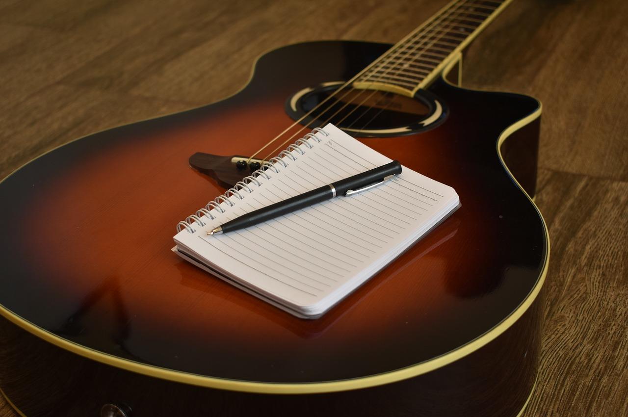 Guitar and notebook