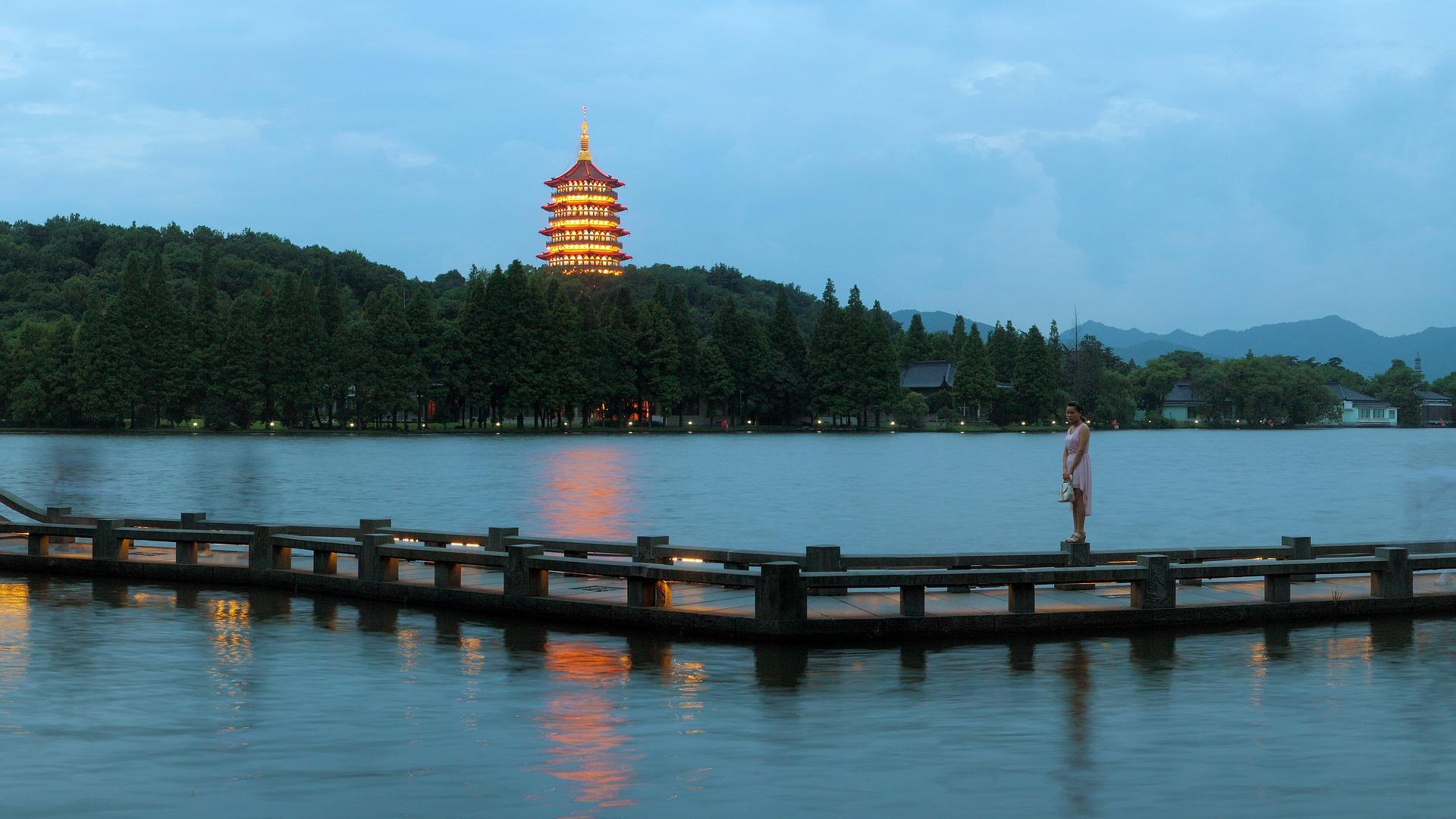 Why should you visit Hangzhou?