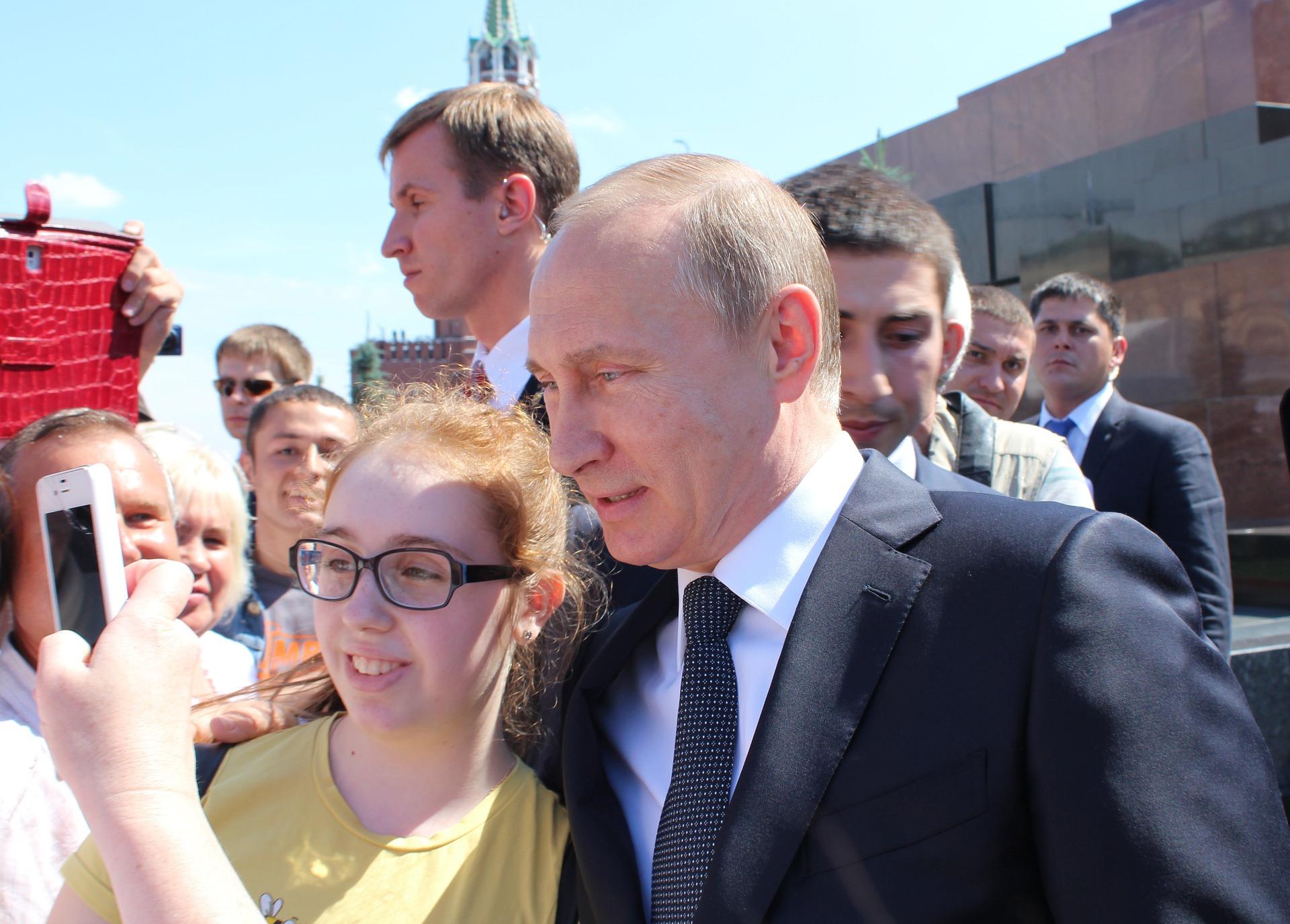 Mr Putin promotes himself as accessible while projecting authoritarian tones