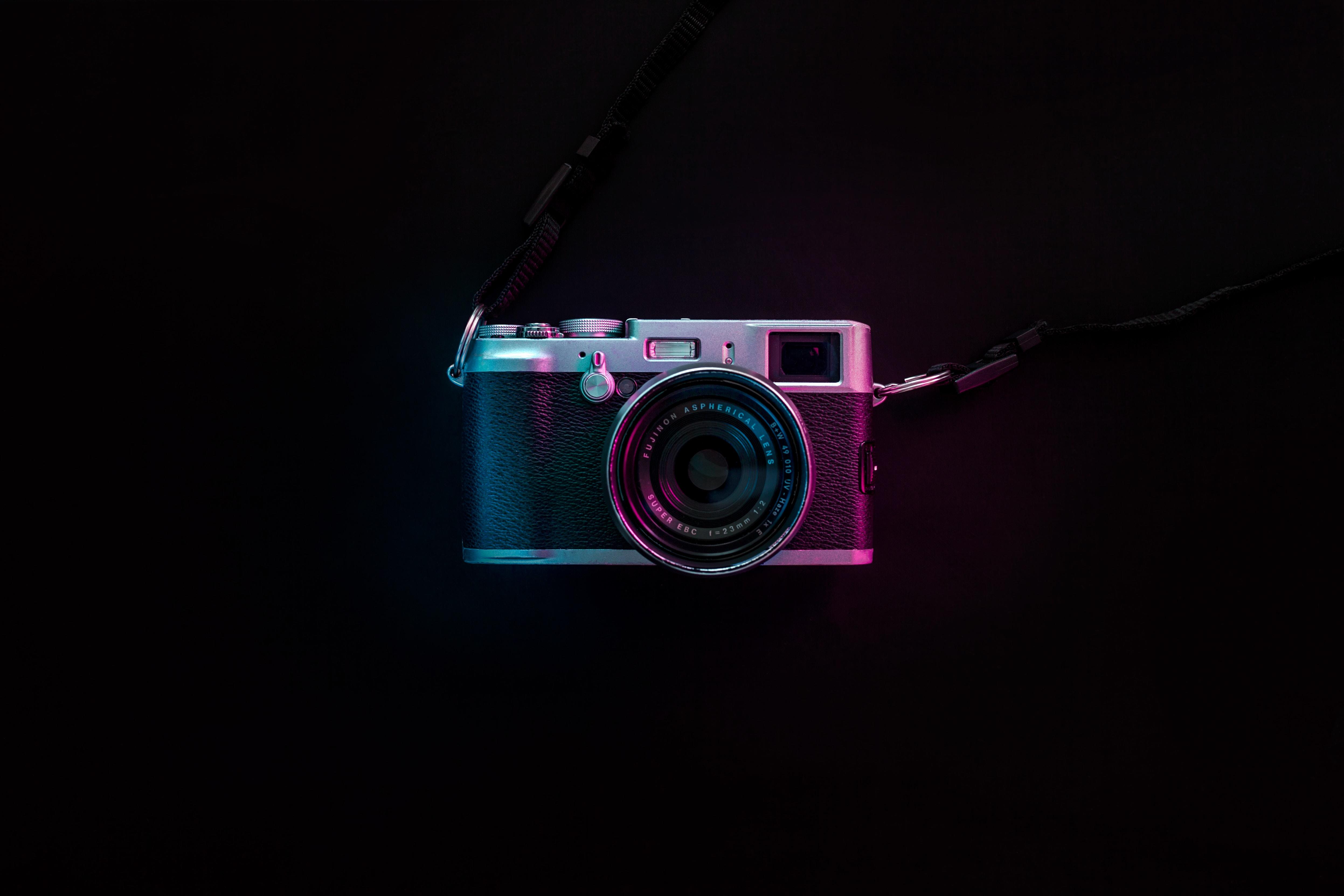 A camera on a black background