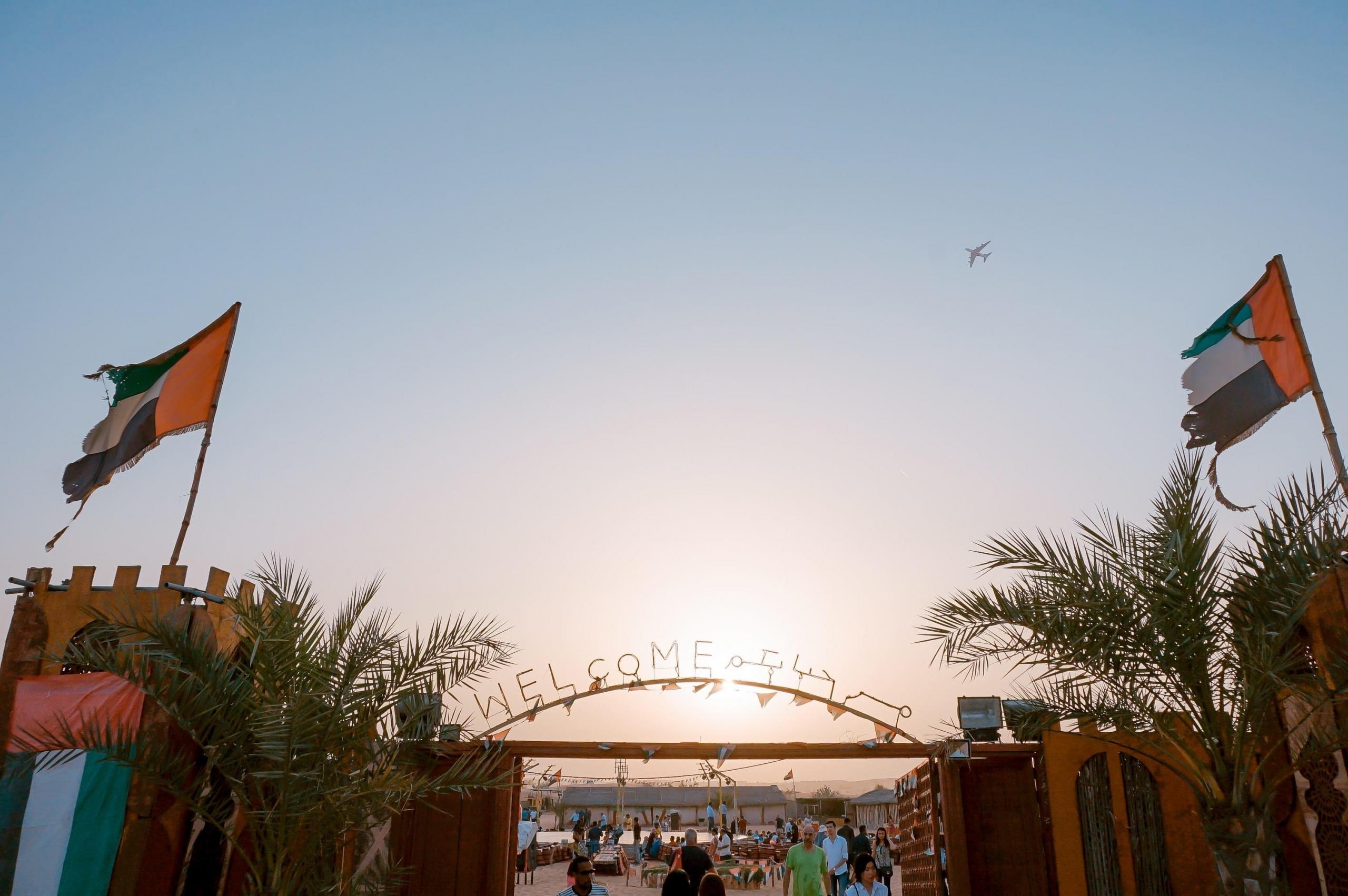 Gate reading 'Welcome' in the Middle East