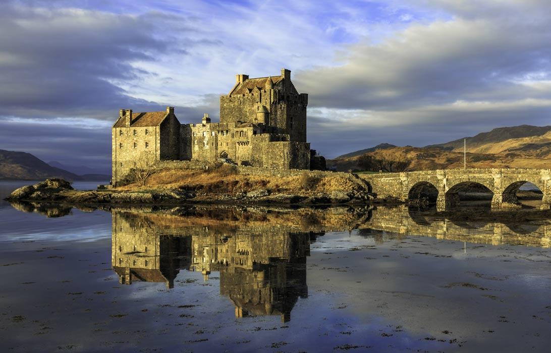 reflection of castle in loch