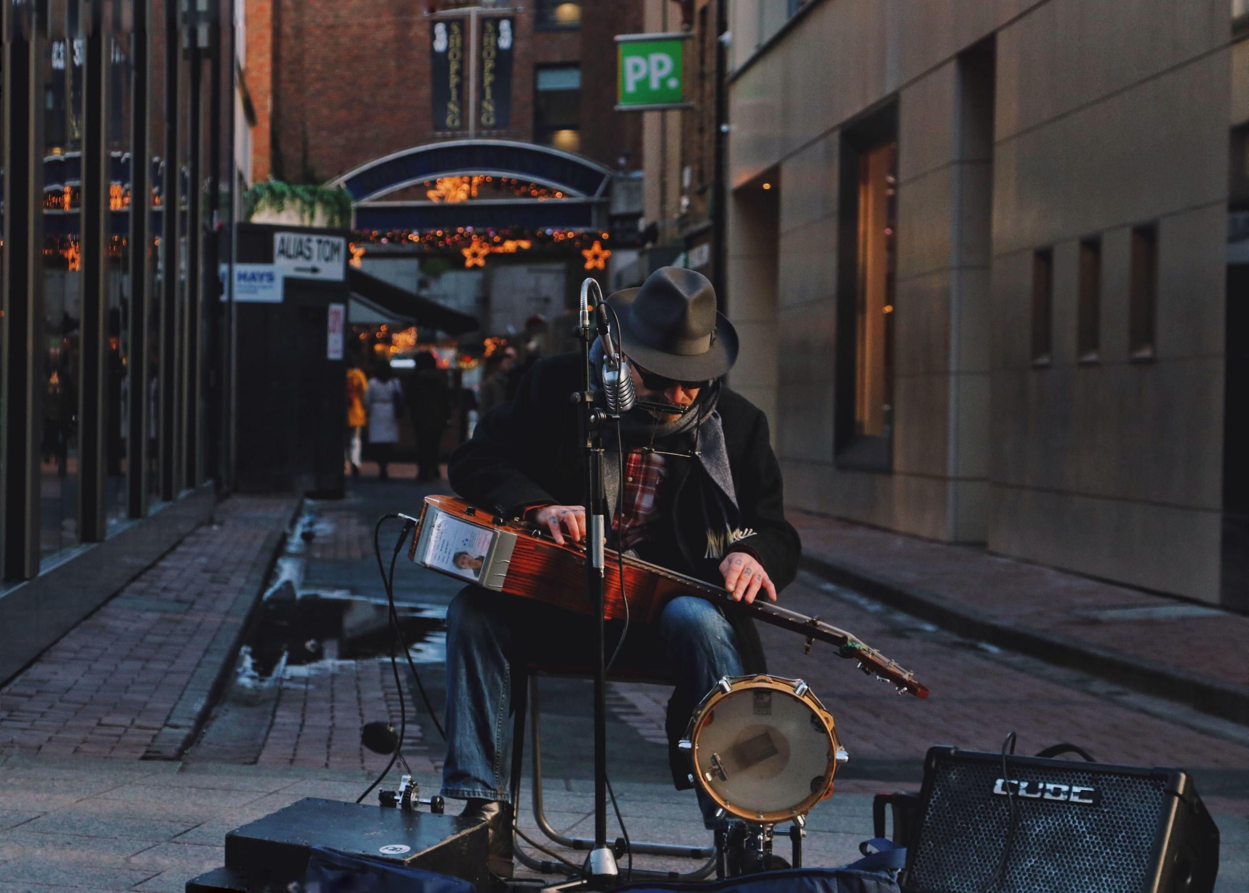 man plays percussion