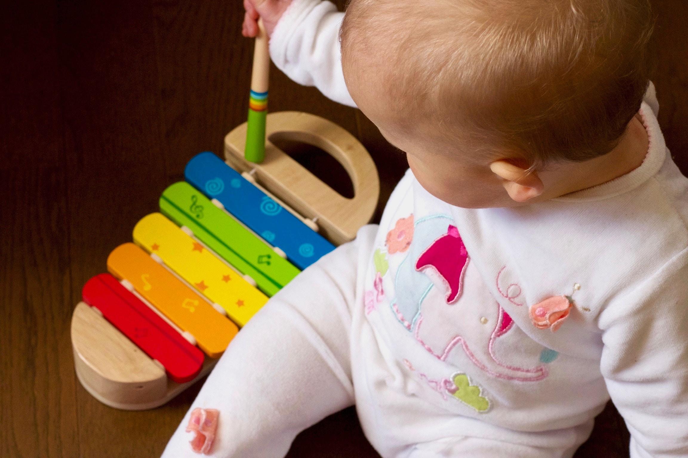 baby plays xylophone