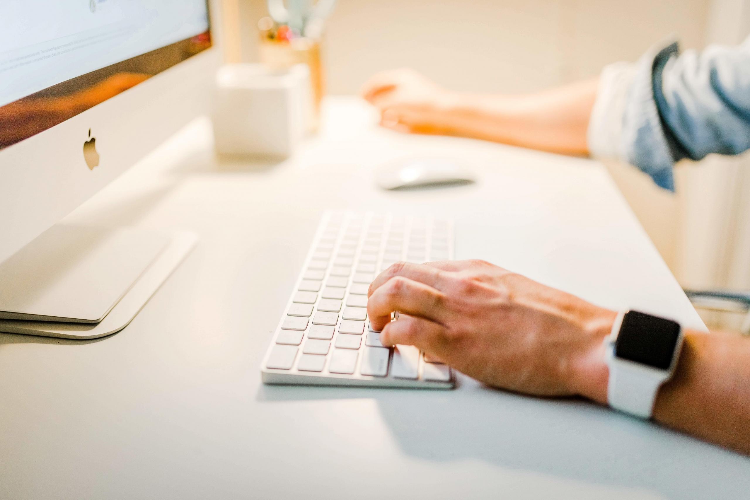 A man working at his computer.