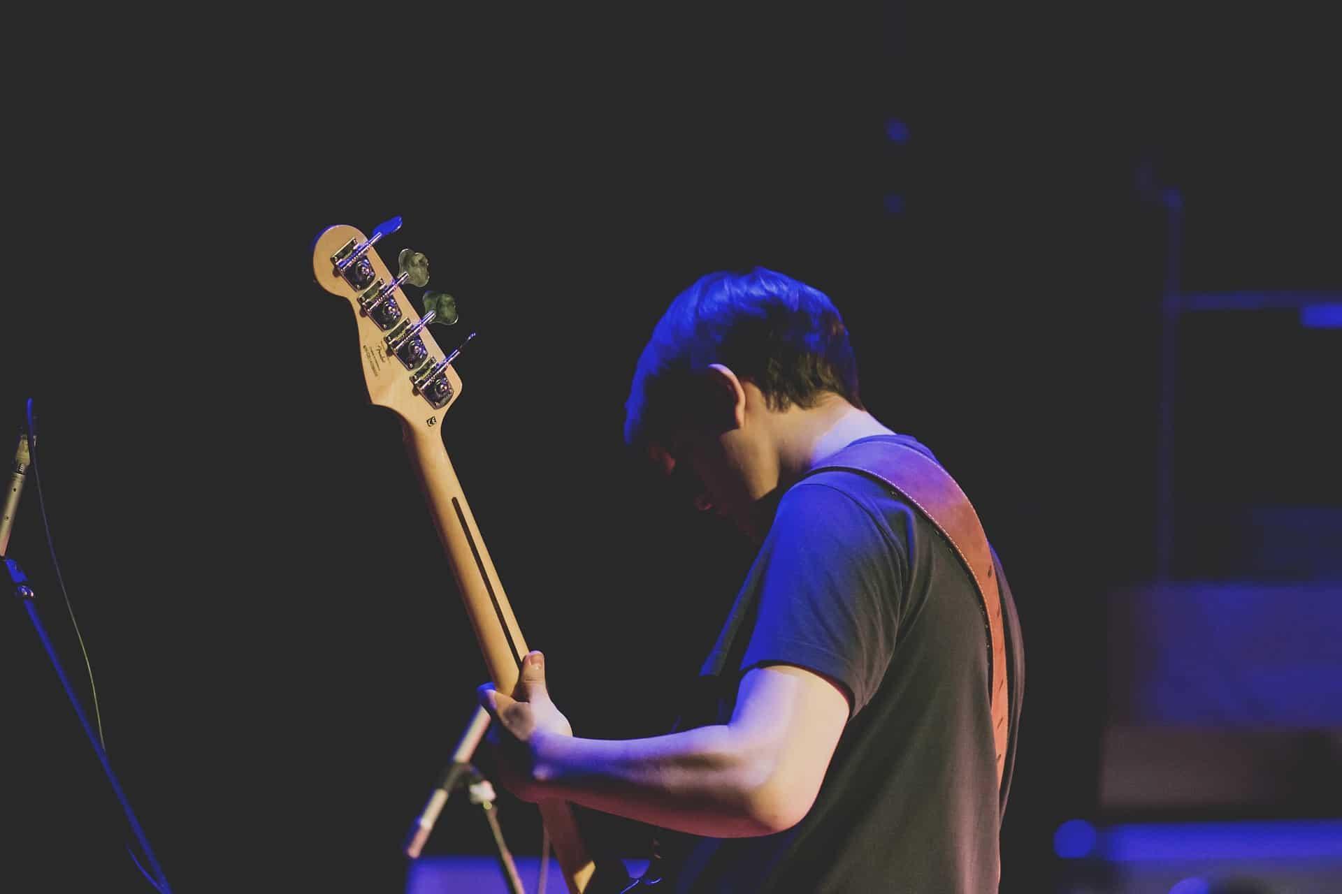 What do bassists do in a band?