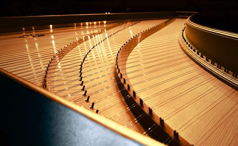How does the mechanism of the harpsichord differ from the other keyboards?