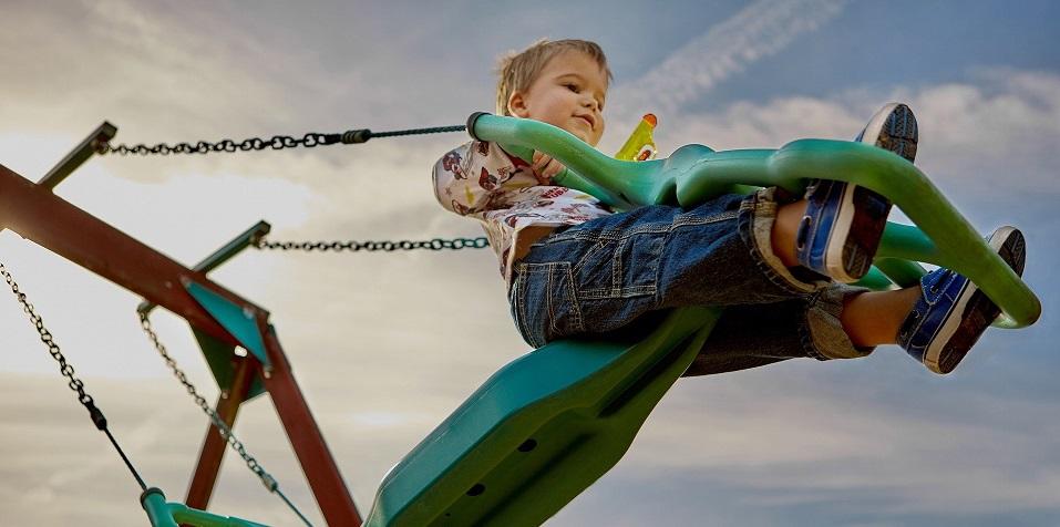 This boy's learning how to swing by himself is just one way he will discover his confidence