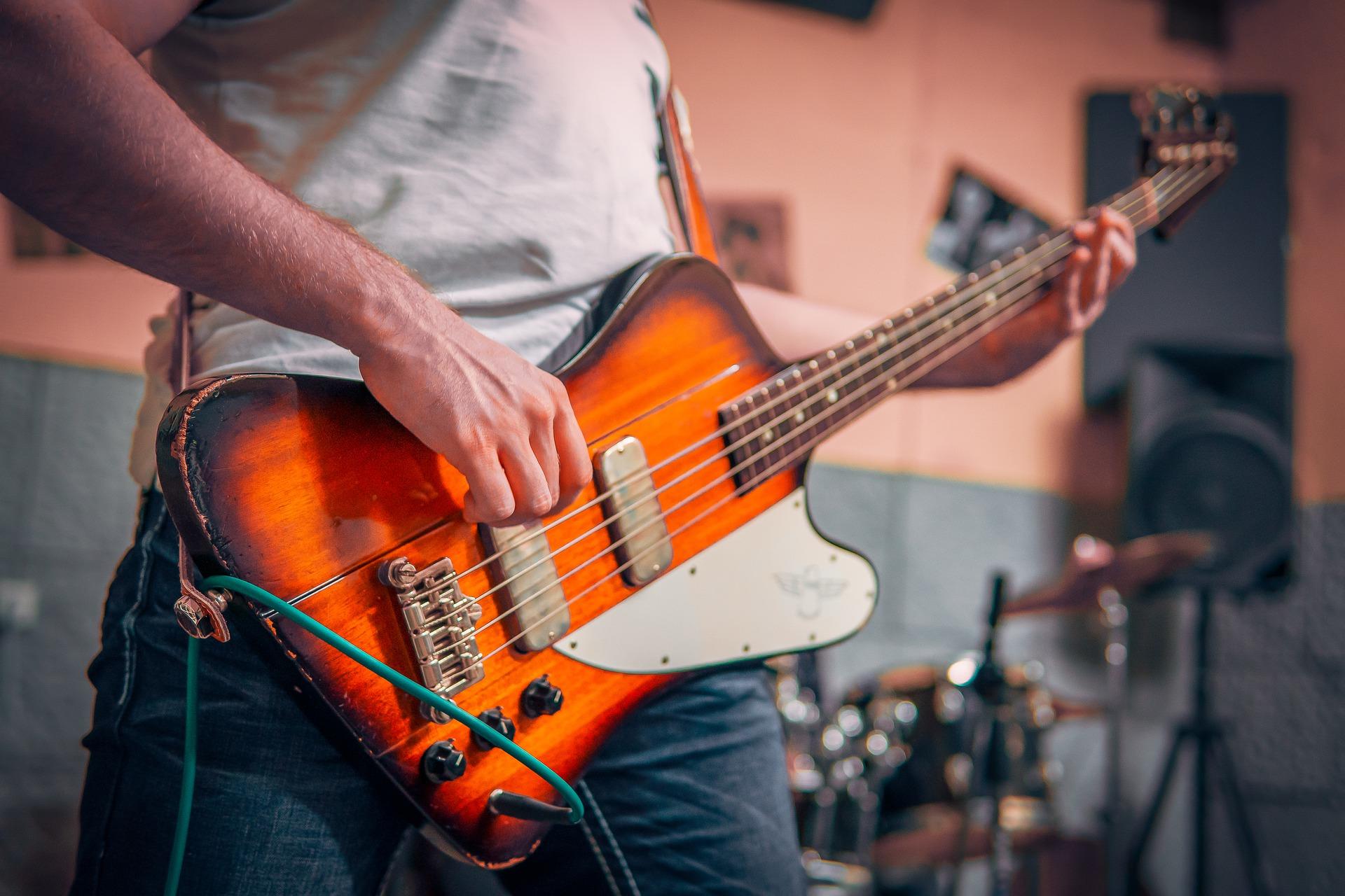 How can you learn to play bass guitar?