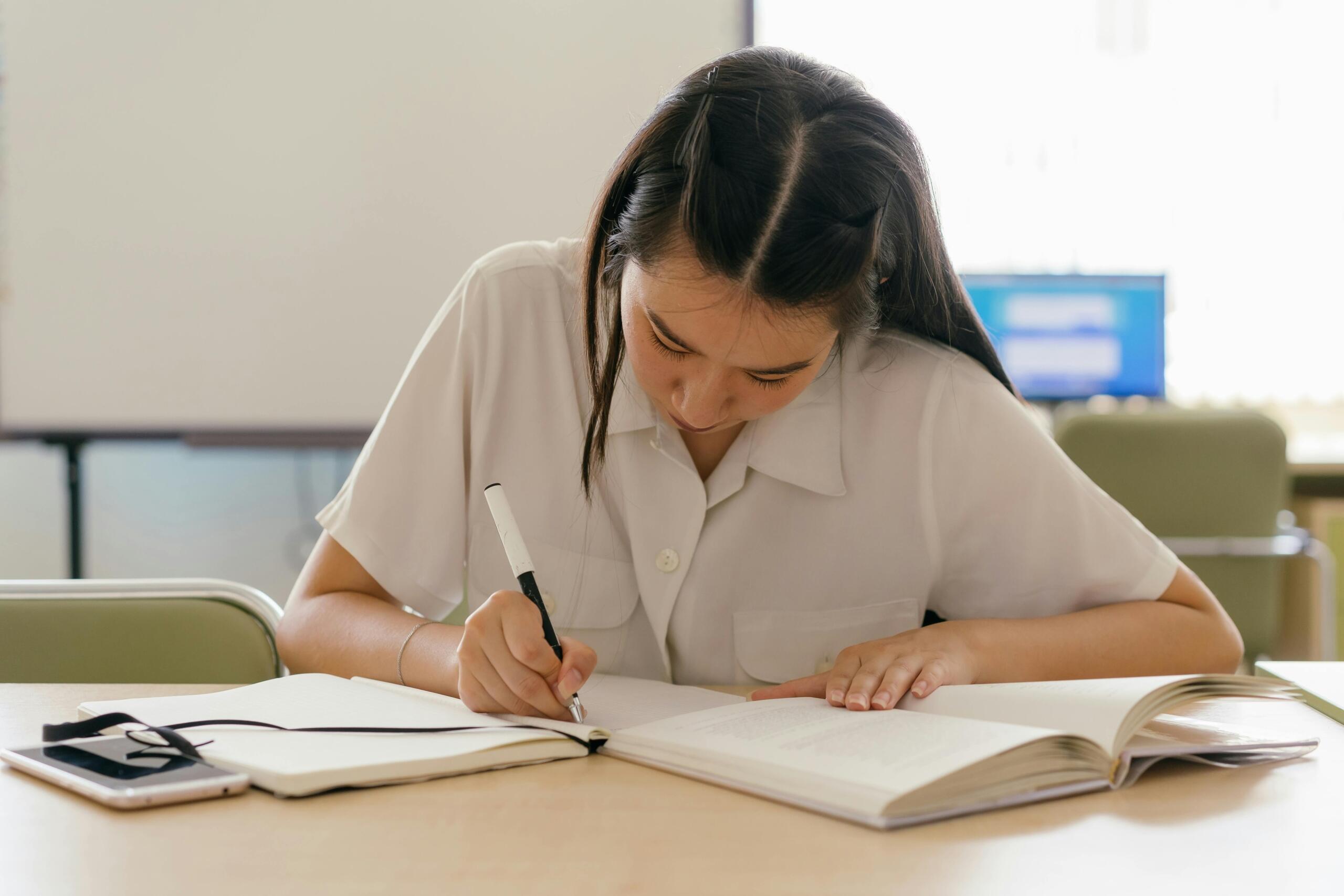Woman studying inside the library