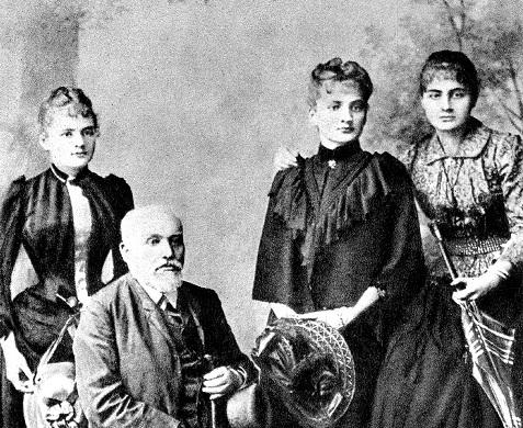 Maria as a young girl with father and sisters
