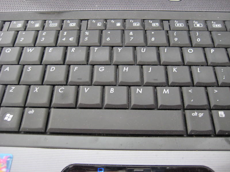 Toggle between English and German typing by adding the German language pack