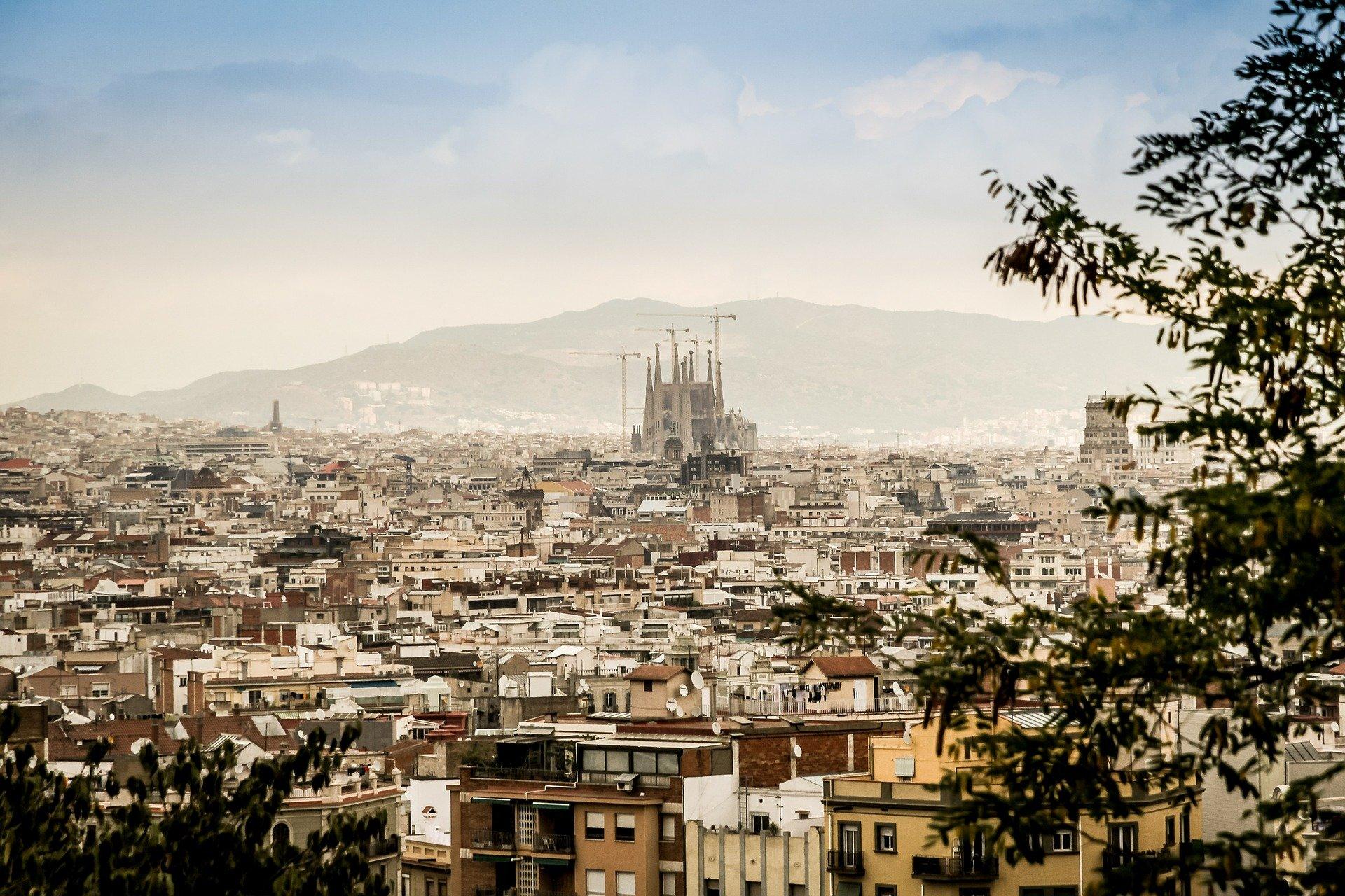 Why should you visit Barcelona?