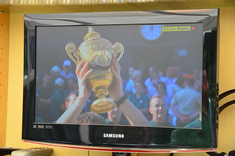 Millions around the world watch tennis greats receive their trophis