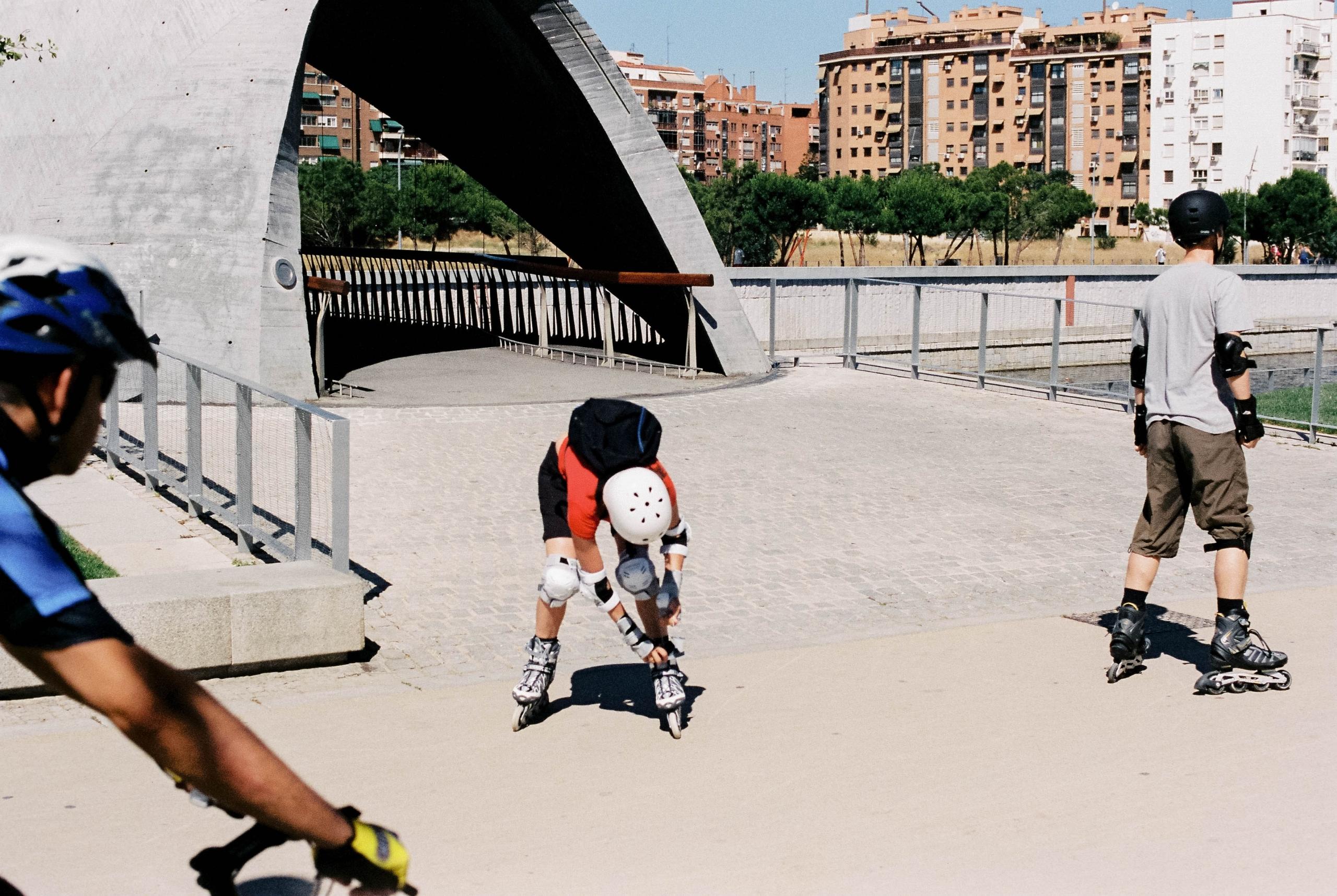 Skater adjusting skates