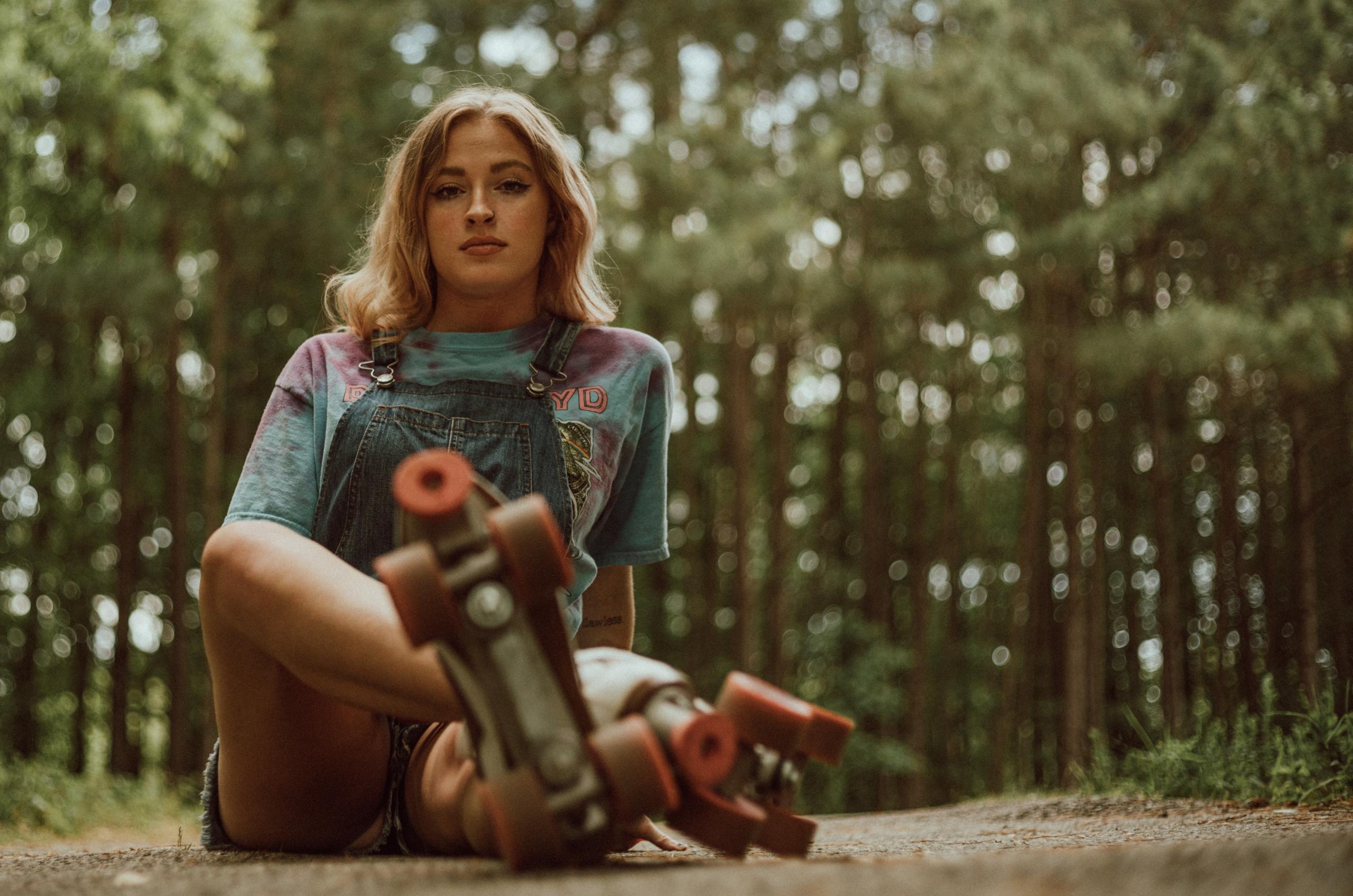 girl showing skates