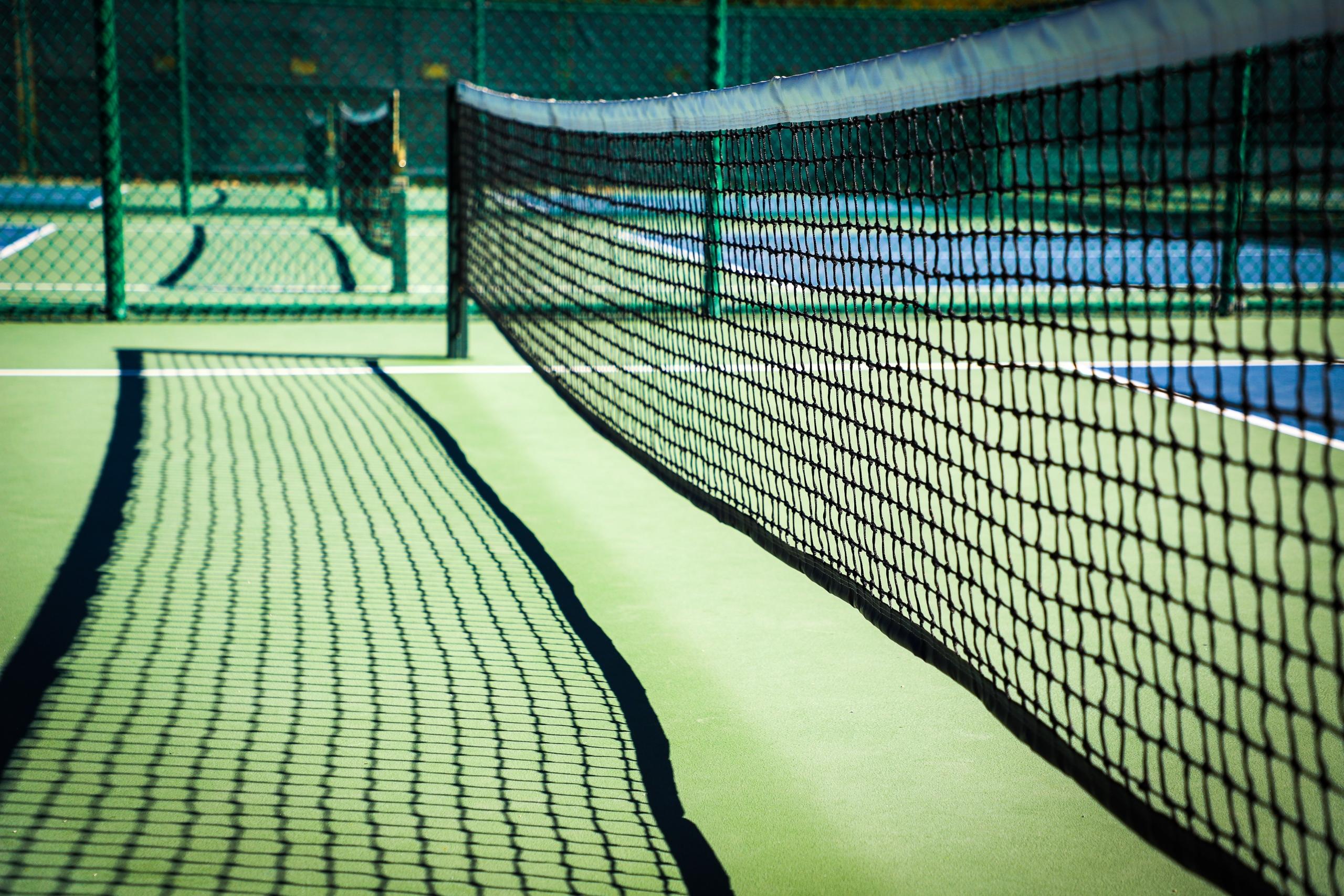 A hard surface tennis court