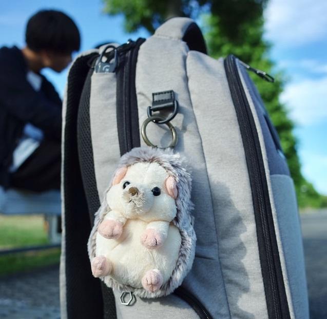 Even men like to show their cute as seen by this backpack tag