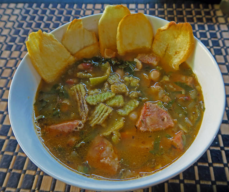 Humans are holozoic, we do not spread enzymes over our food before eating it