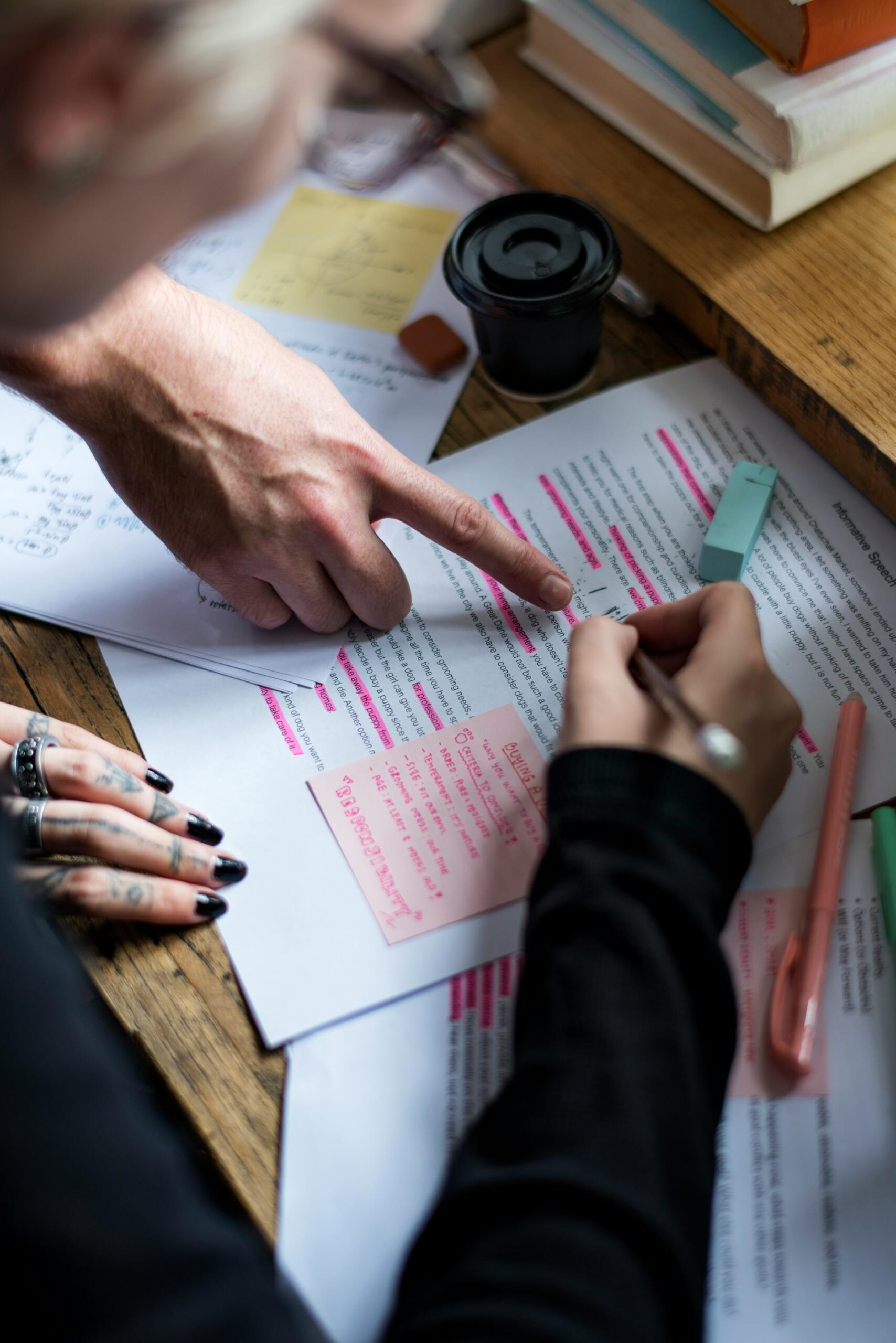 Checking and correcting a paper.