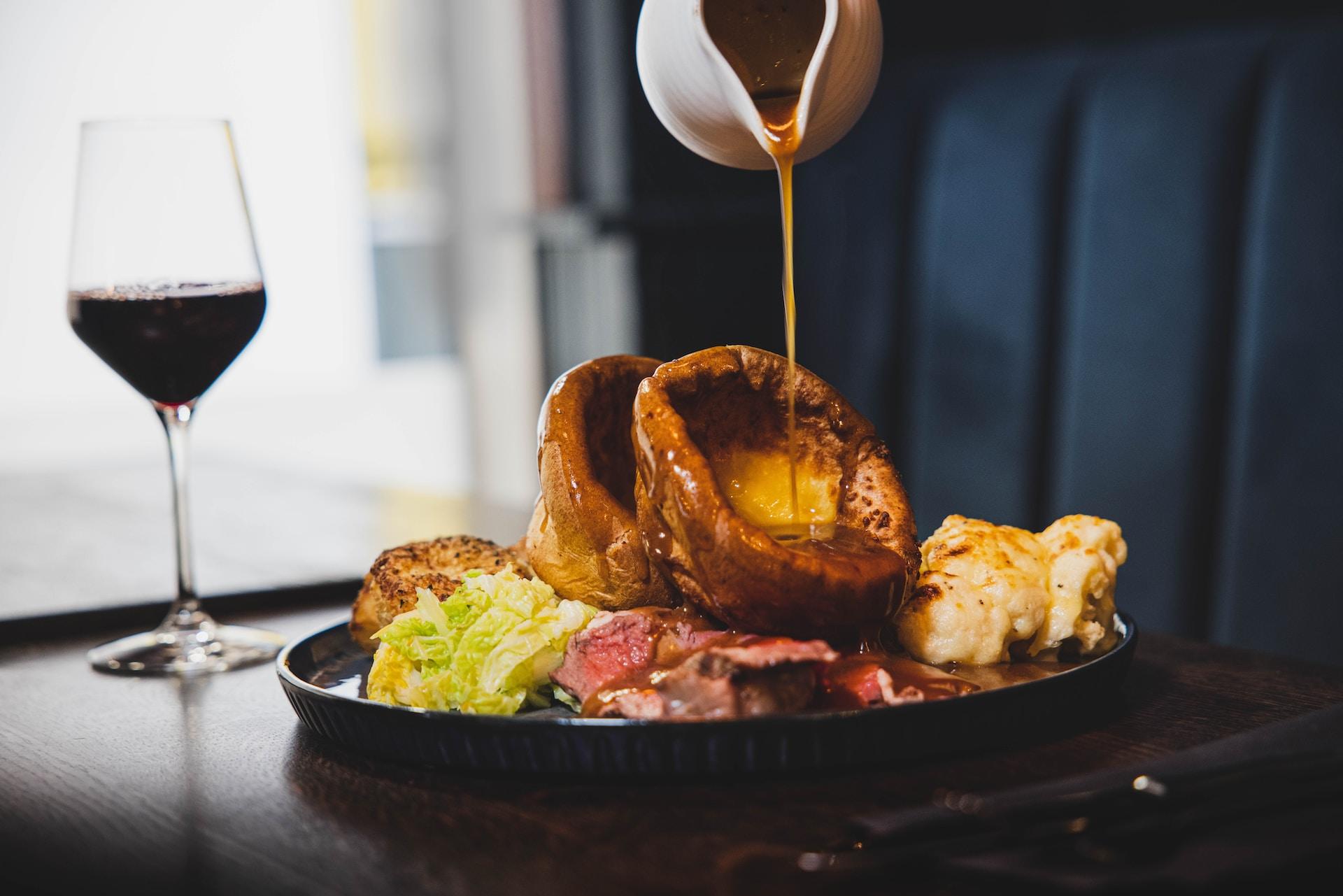 Yorkshire Pudding served on a plate.