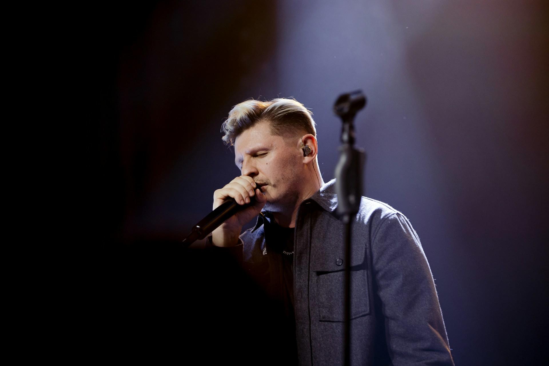 male singer performing on stage