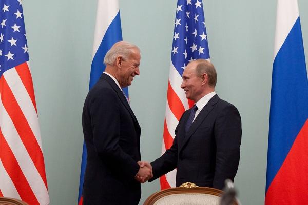 Presidents Biden and Putin during the 2011 meeting in Moscow