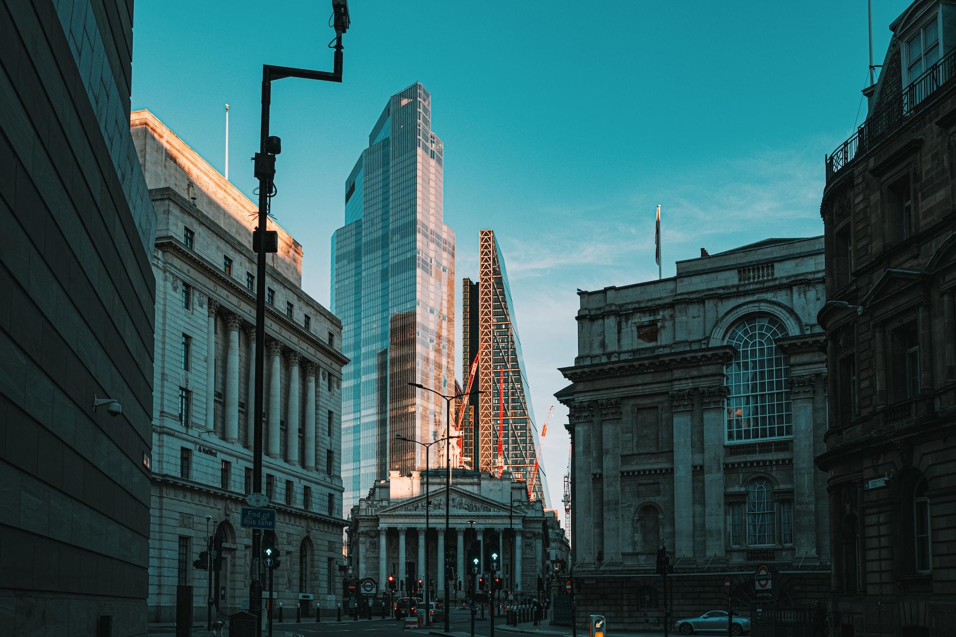 The Bank and England in panorama with building construction behind it.