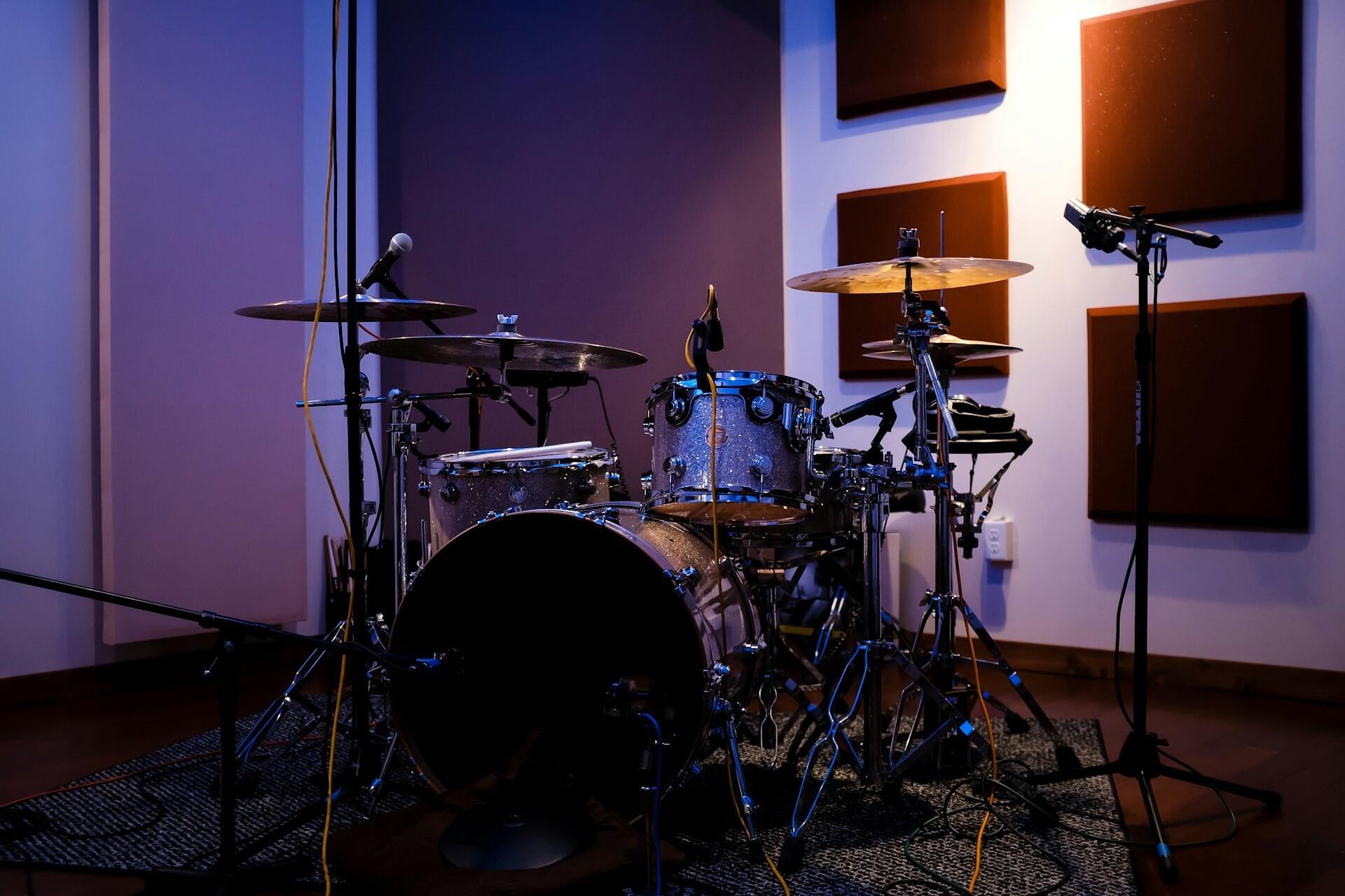 A drum kit in a studio.