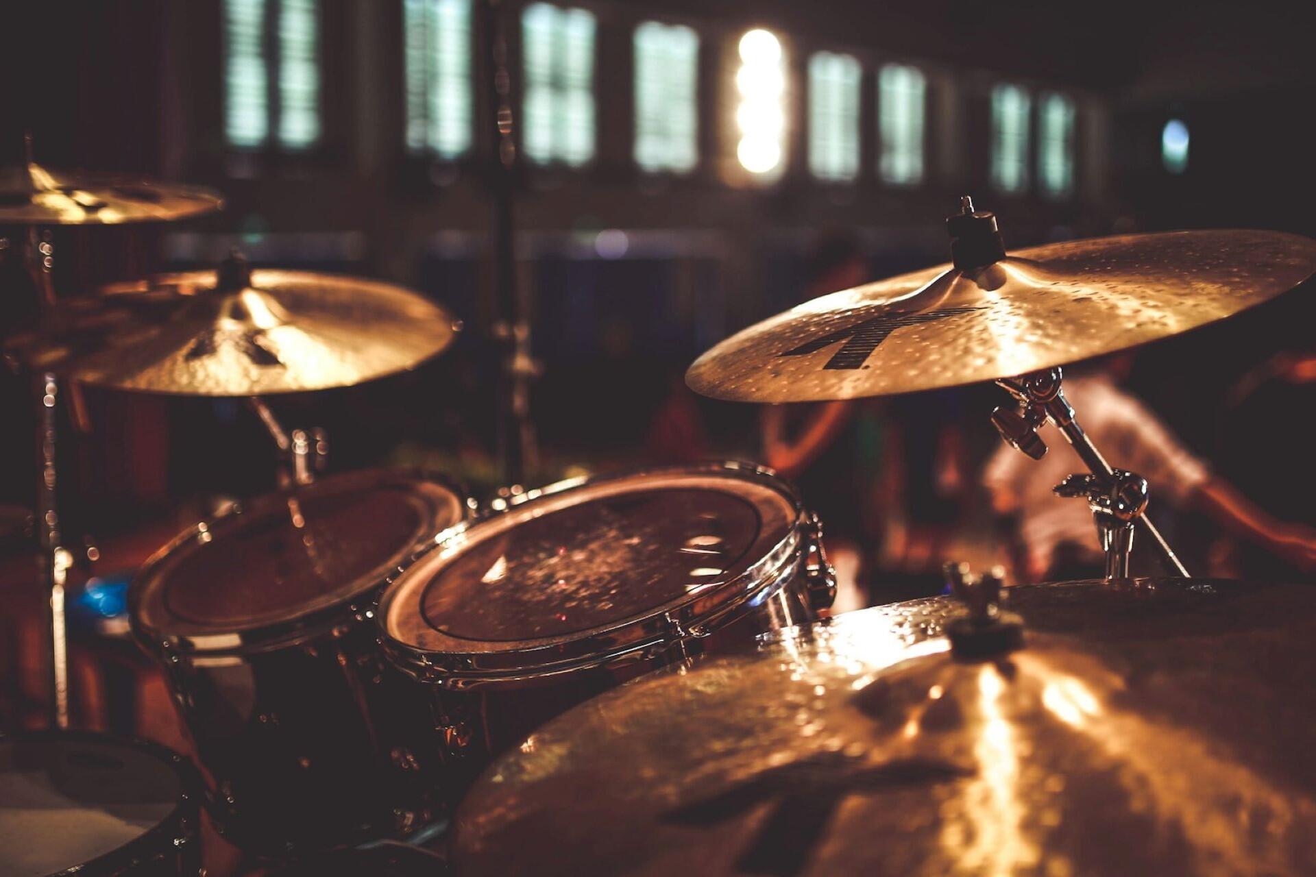 A drum kit on a stage.