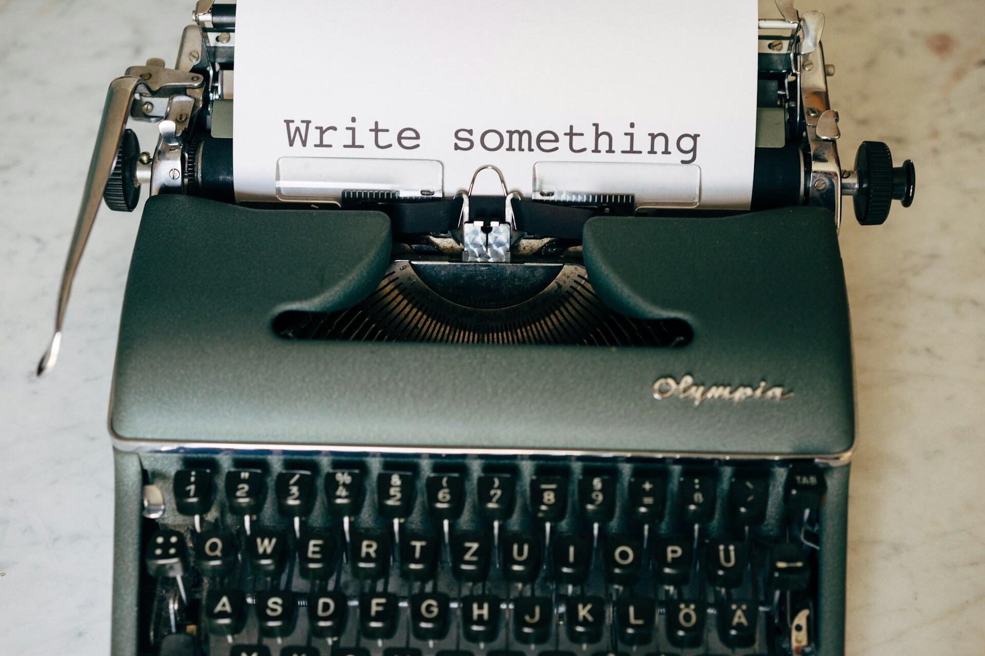 Typewriter on a desk.