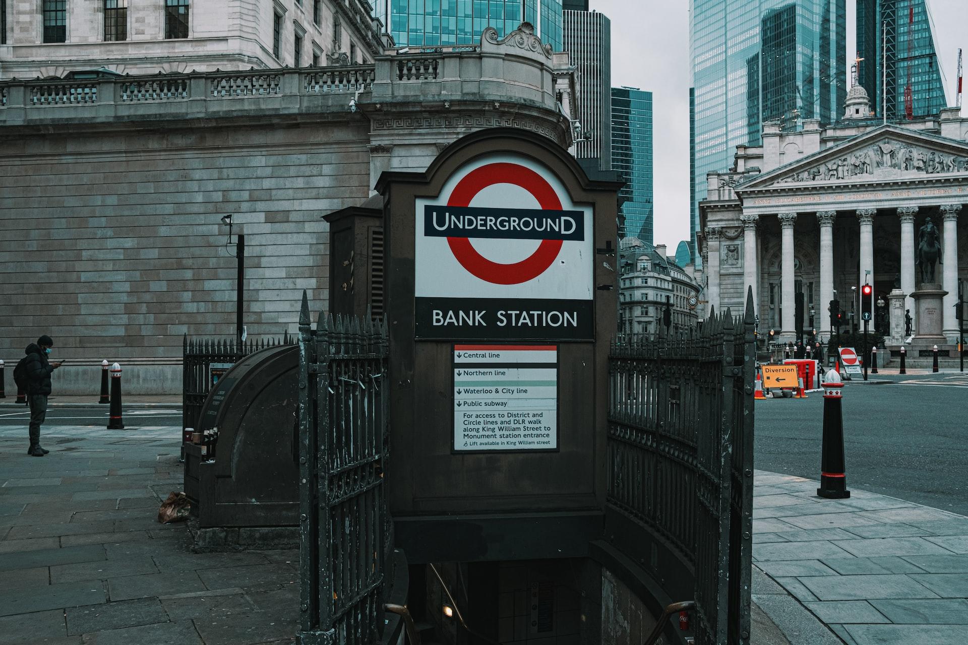 A London tube station in front of the Bank of England.