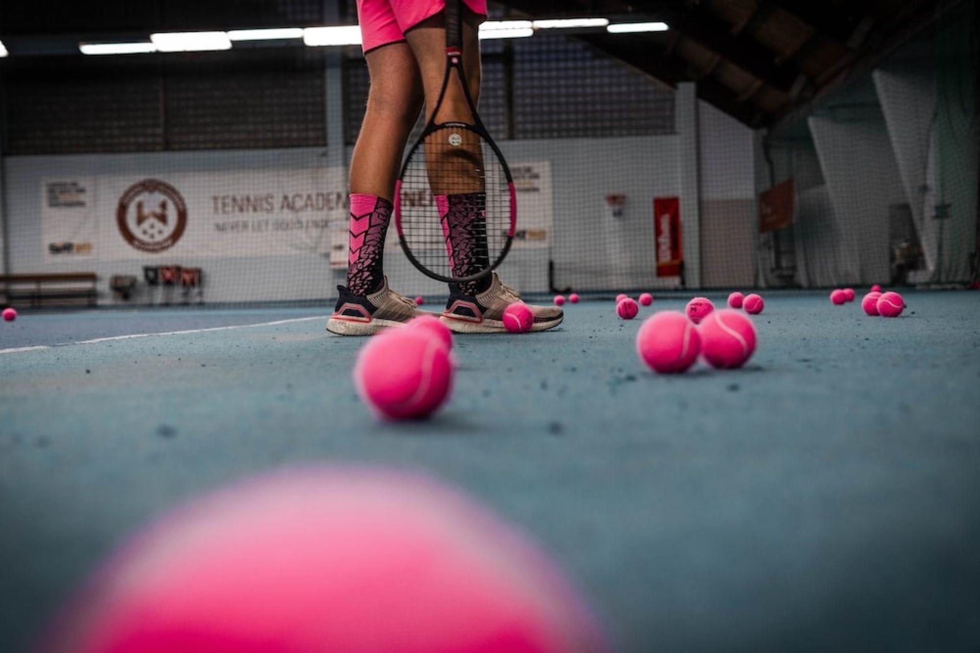 A private tutor giving a tennis session