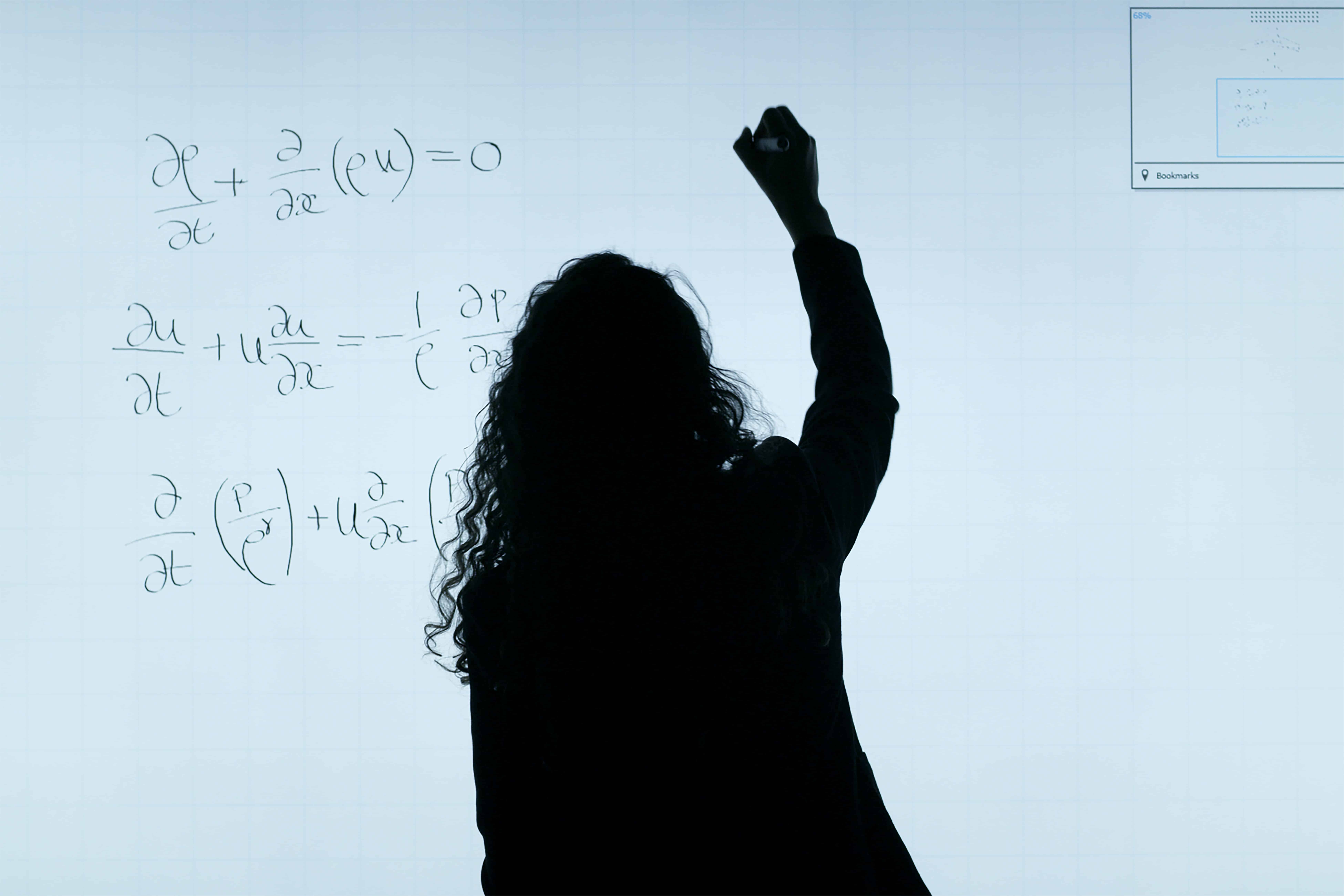 Solving an algebraic equation on the board.