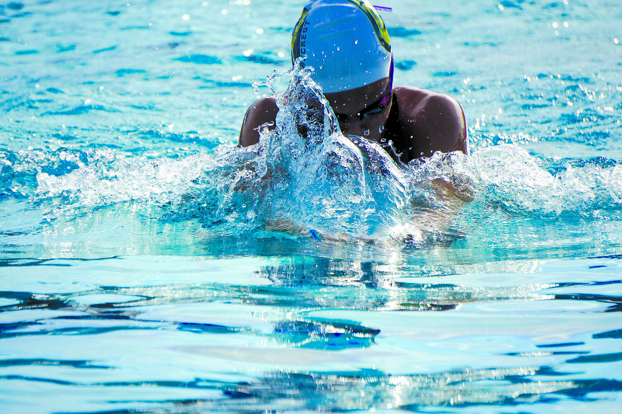 woman breaststroke swimming sport water