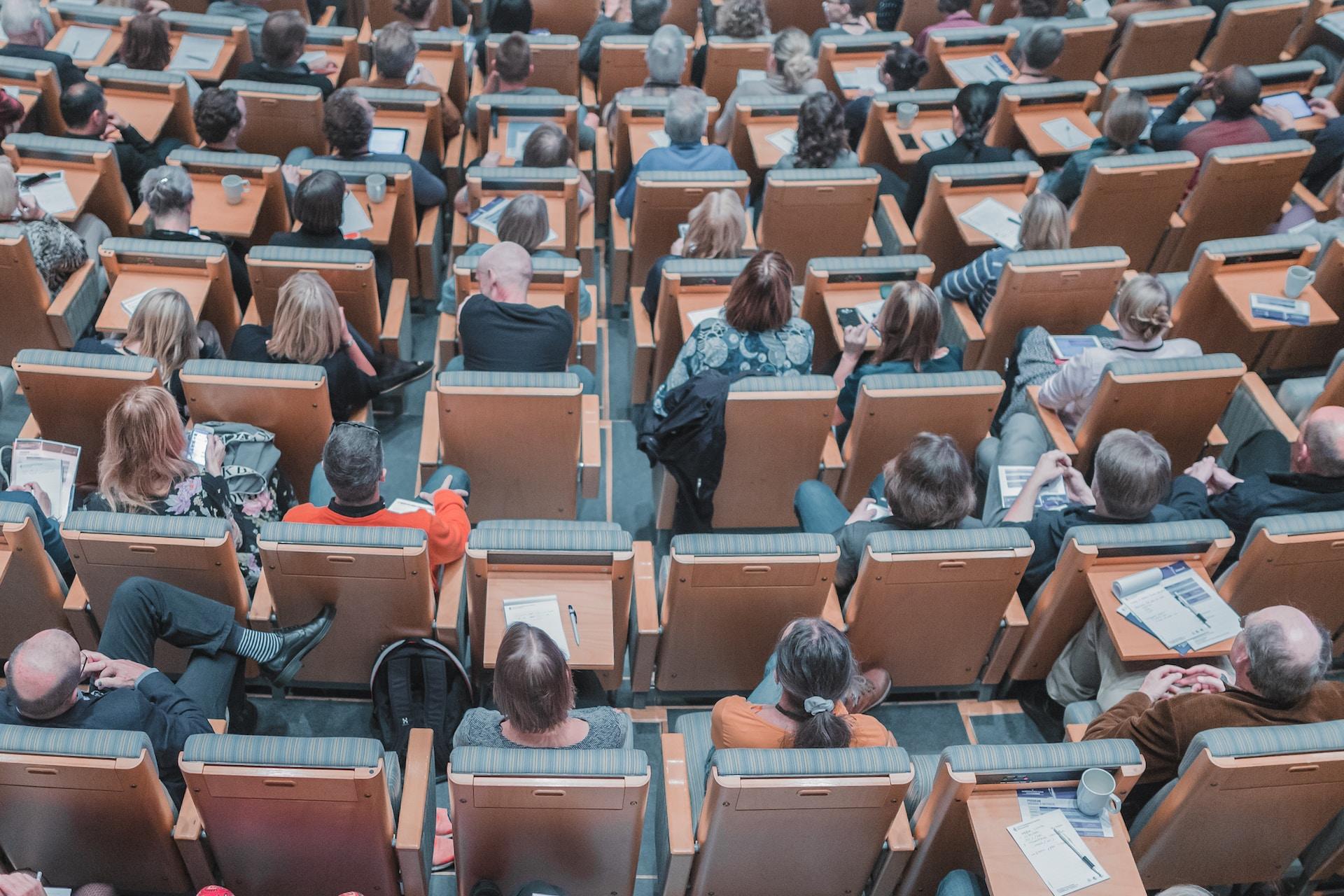 Students in a university lecture hall.