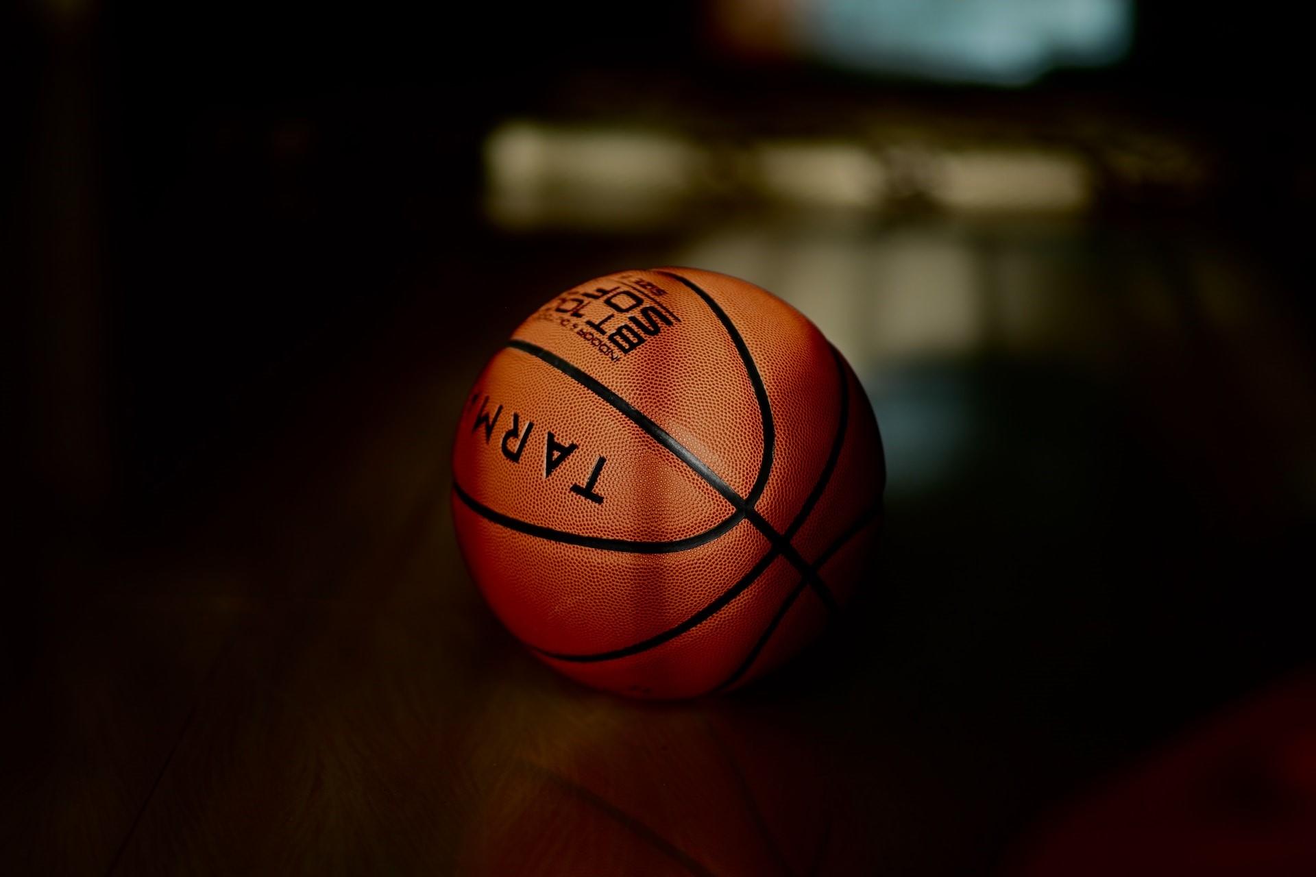 A basketball on the floor.