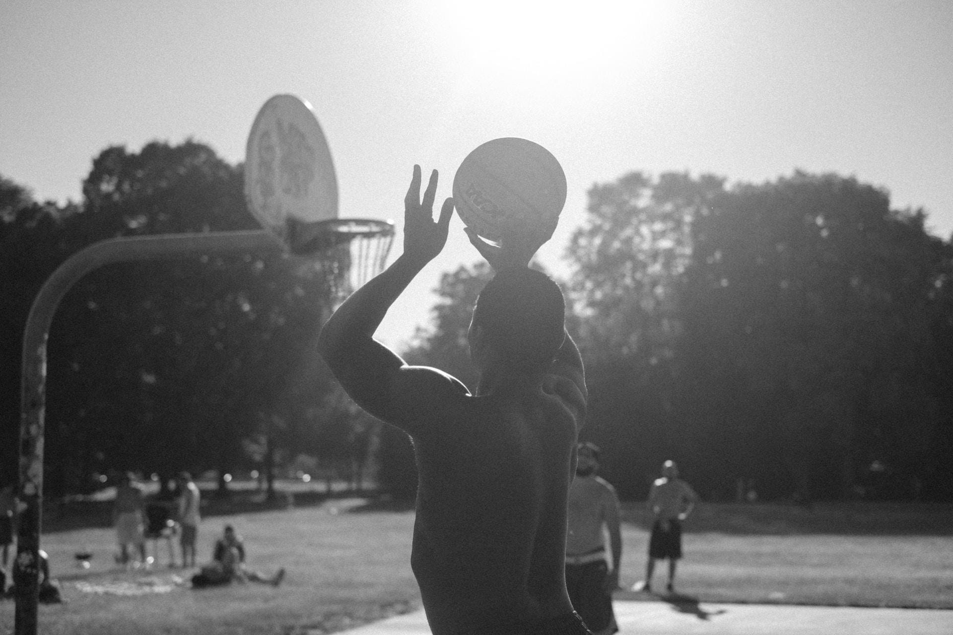 A basketball player making a shot.