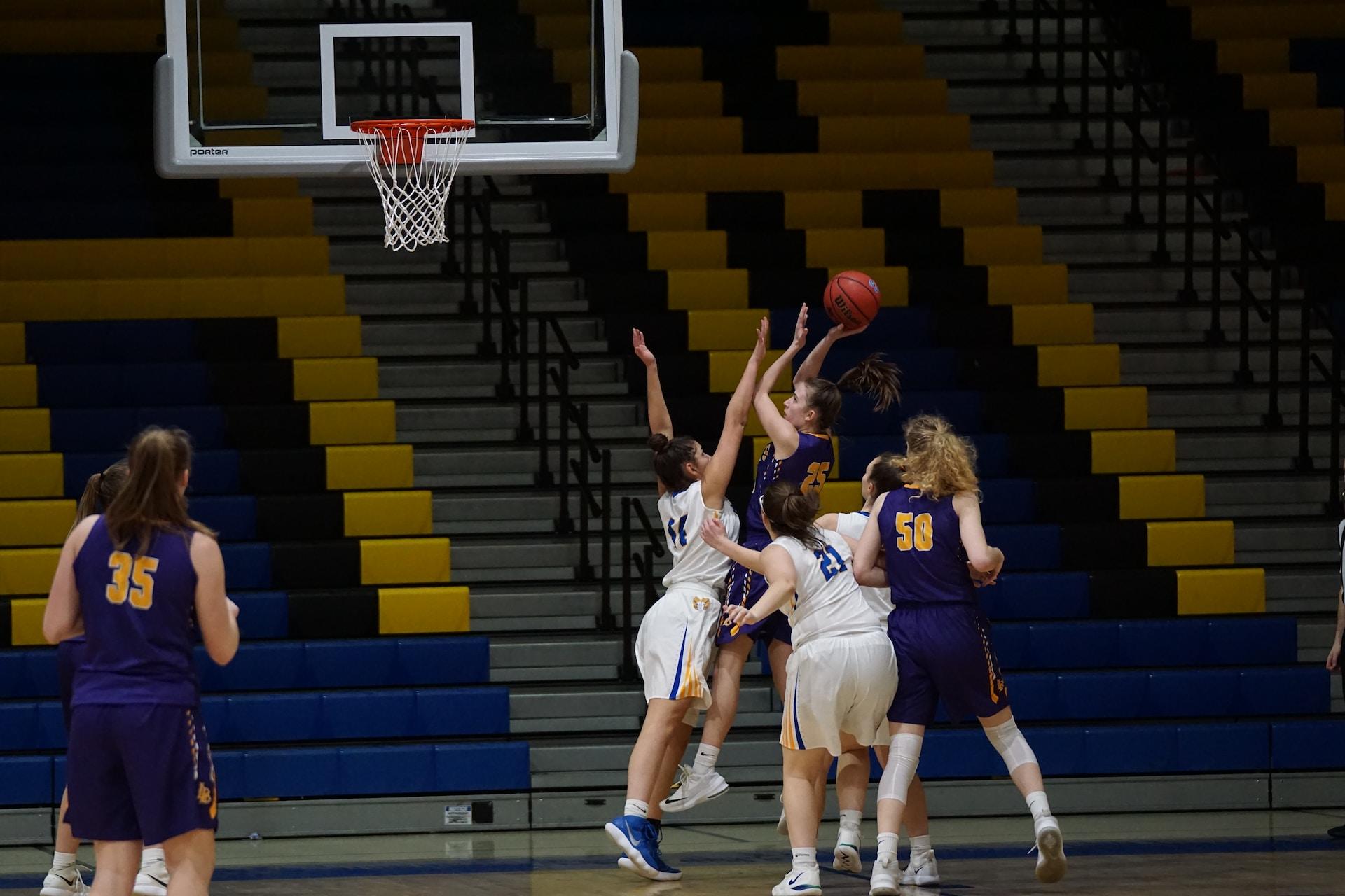 Girls playing basketball.