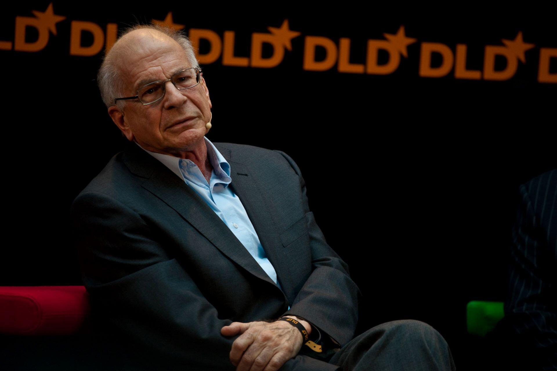Daniel Kahneman speaking at a conference.