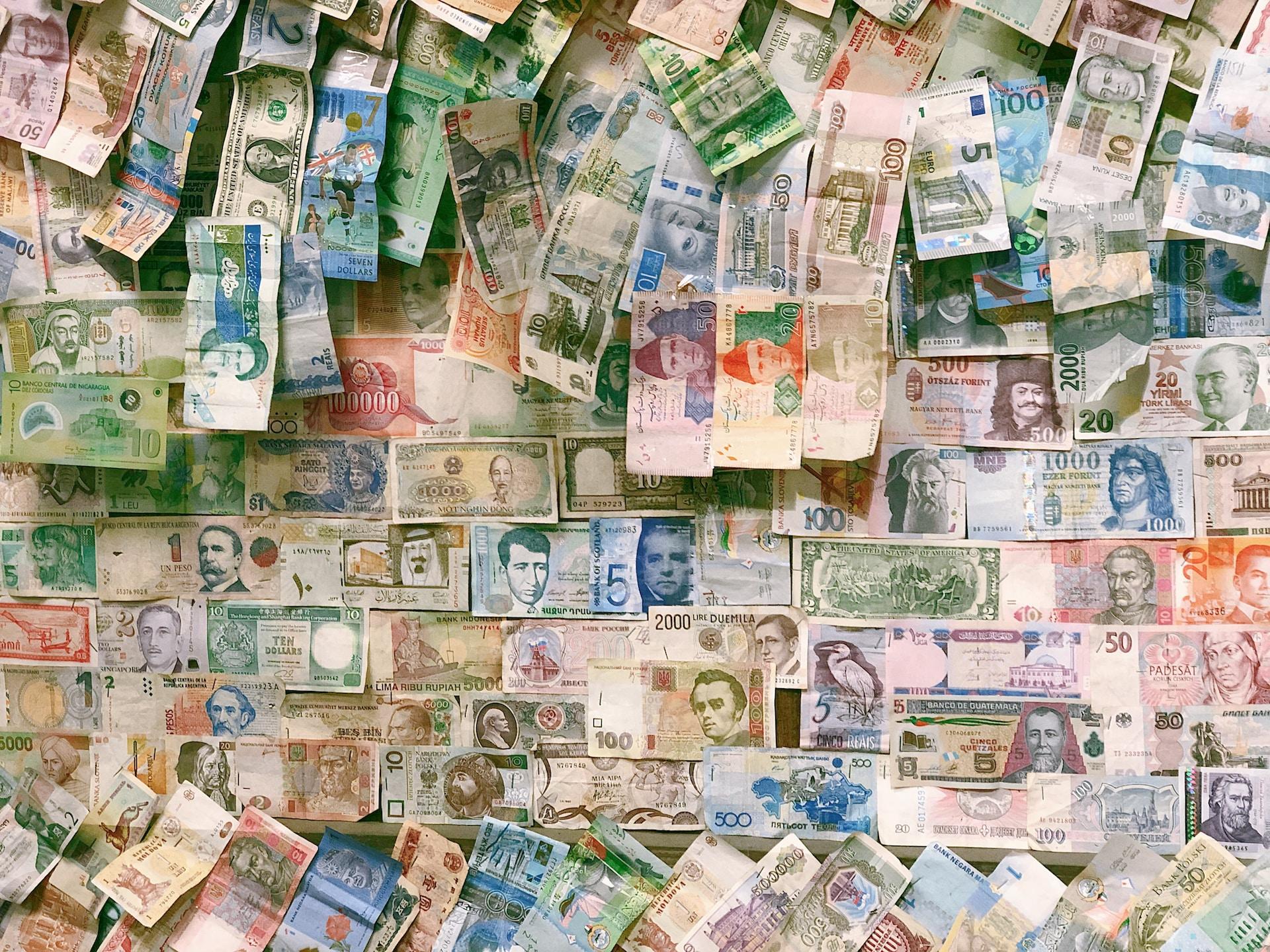A colourful montage of lesser-known global currencies