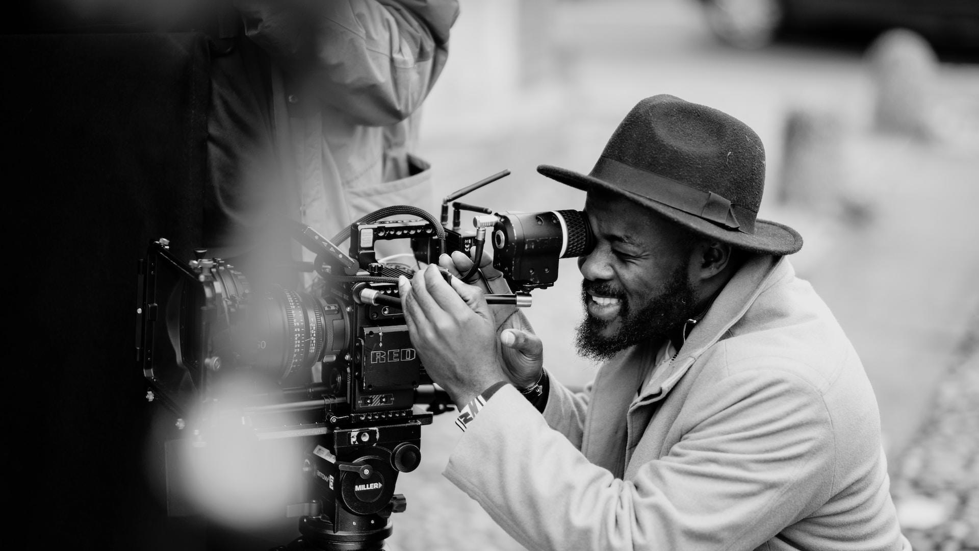 Man holding a film camera.