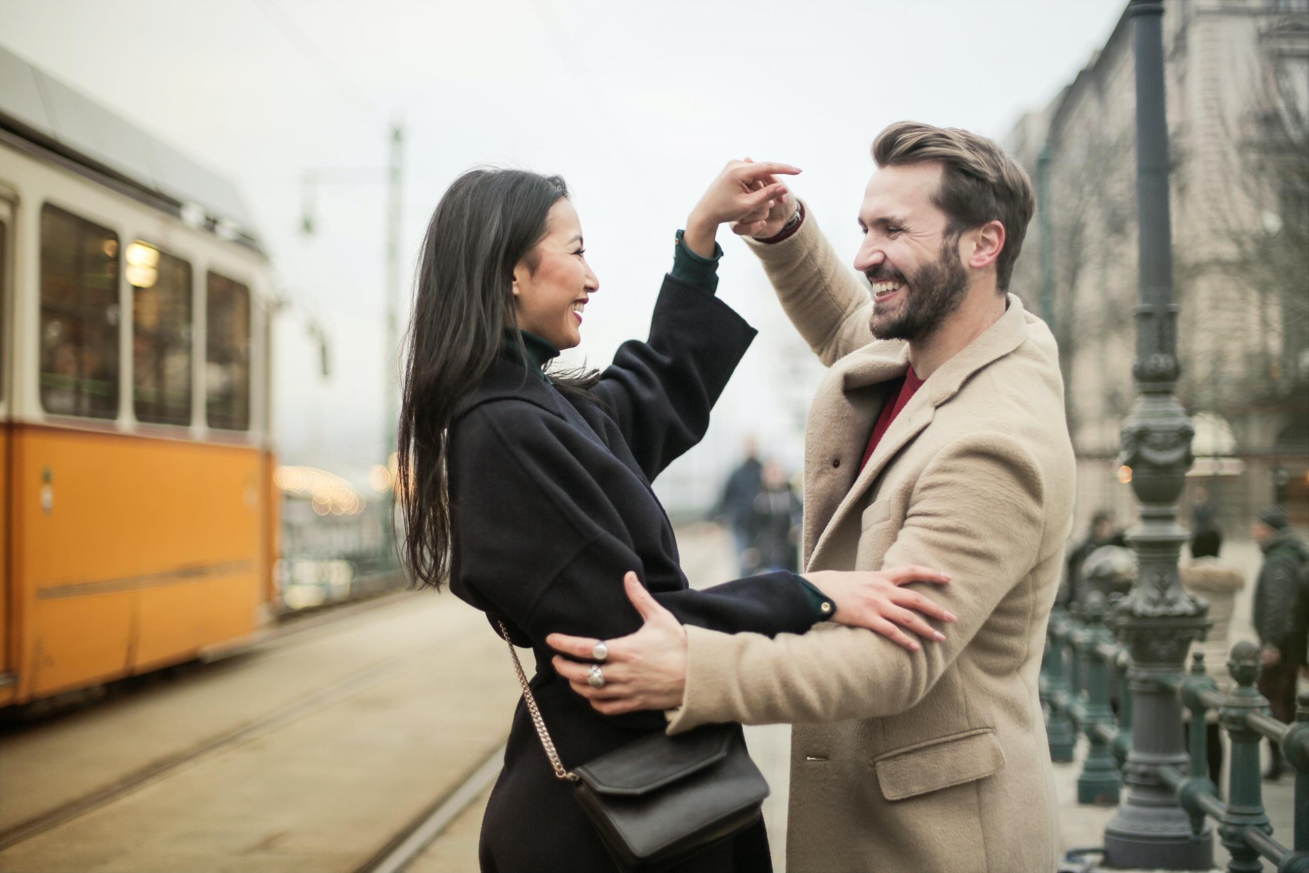 A young couple dancing.