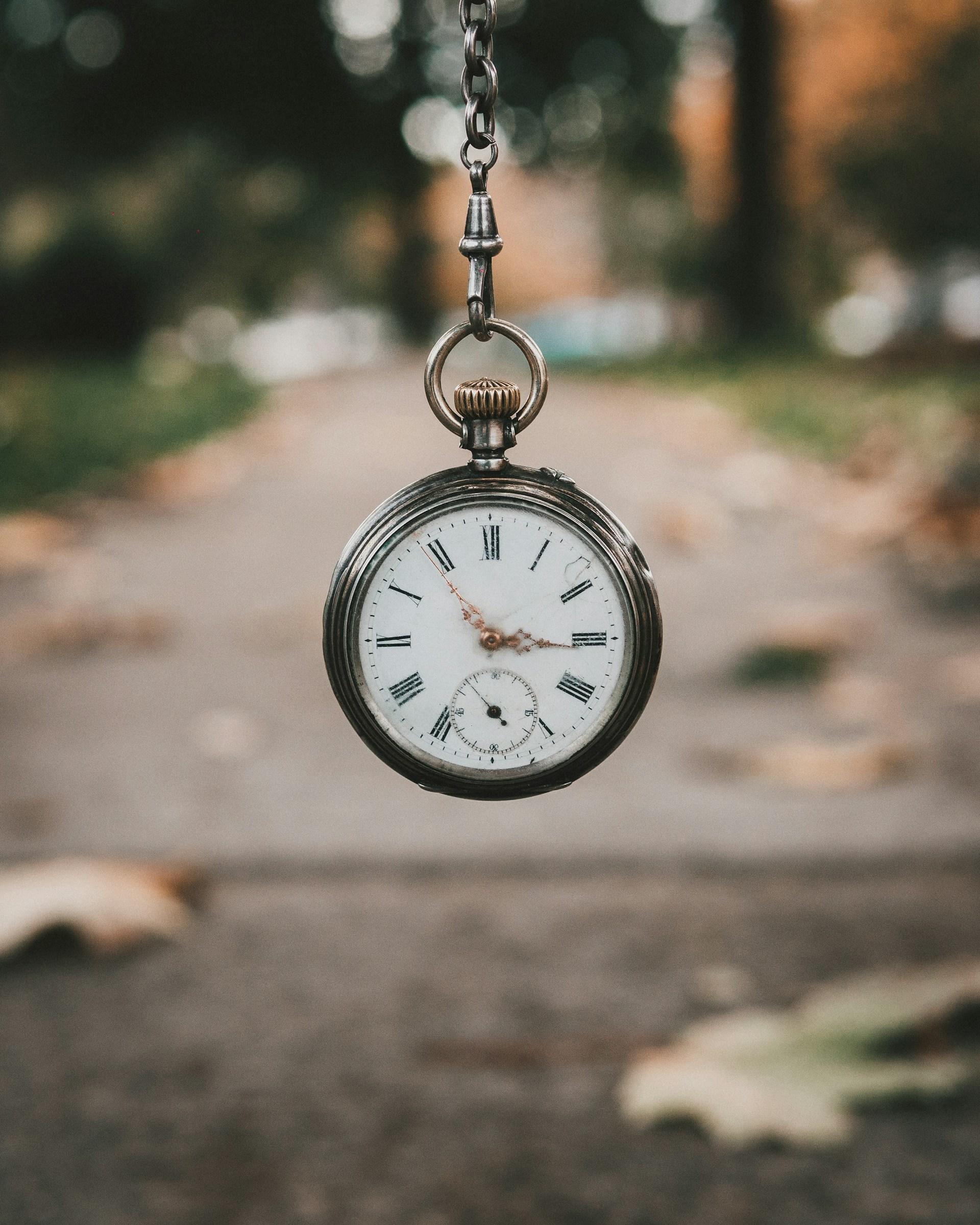 old stop watch in a park scene