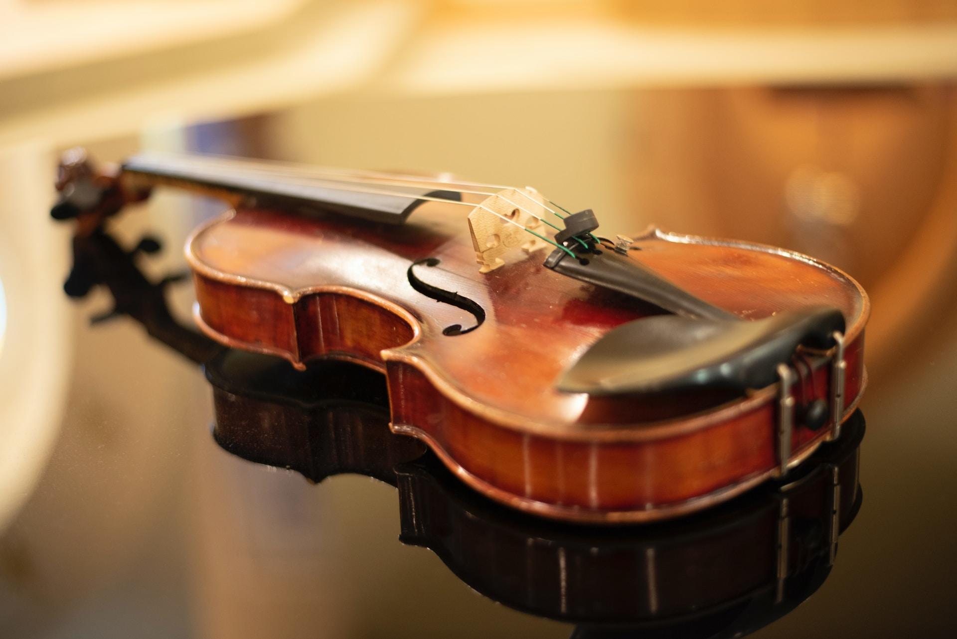 A violin on a table.