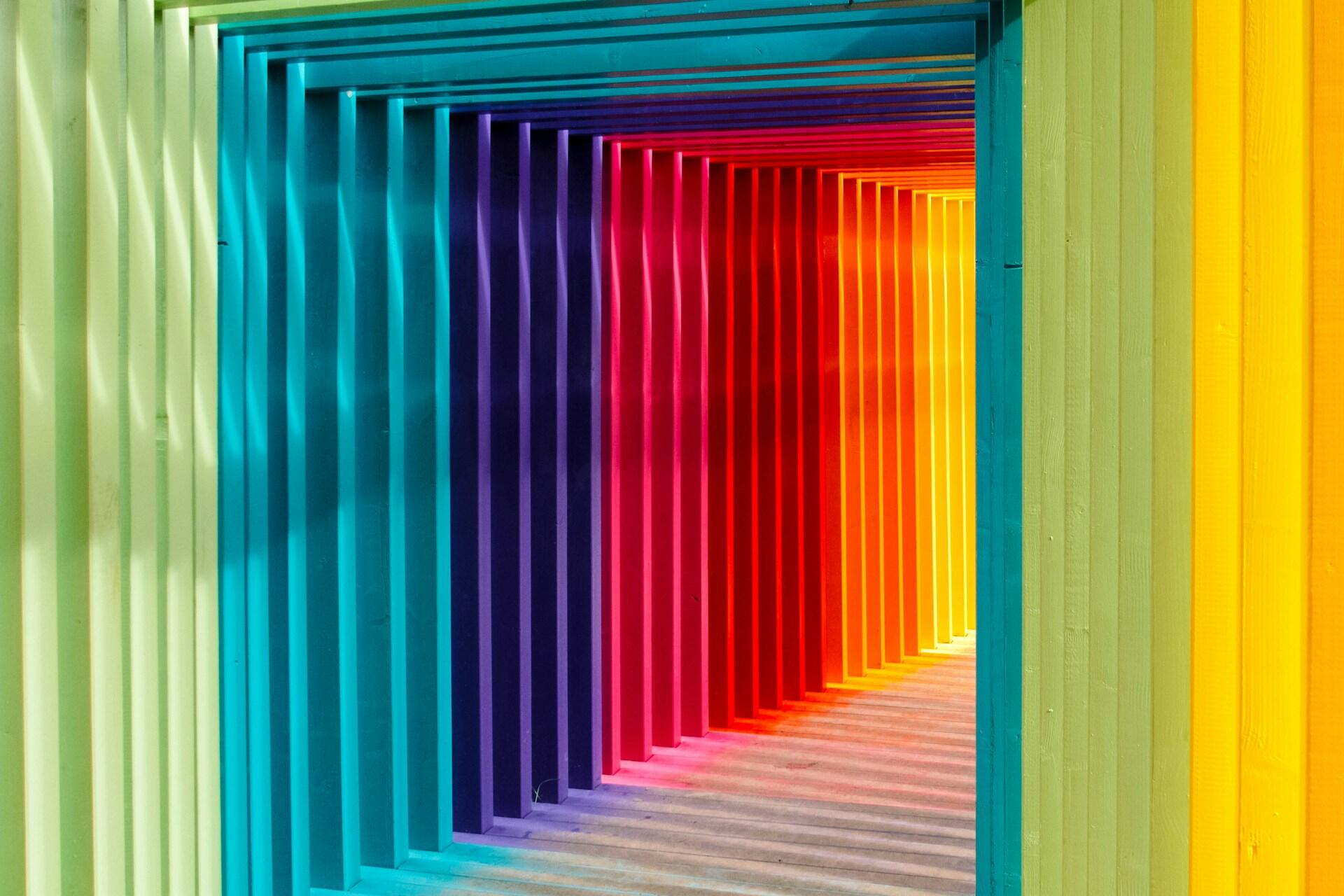 An array of coloured poles. 