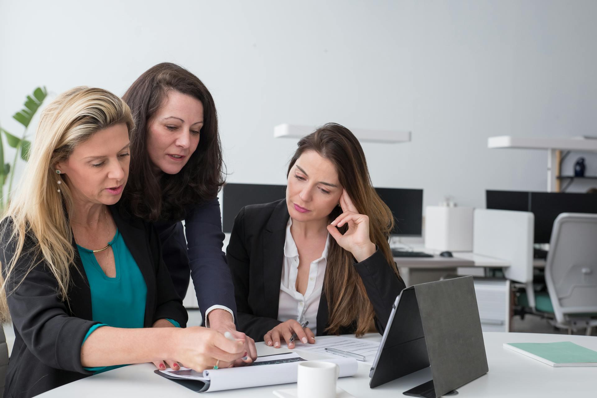 women discussing about a subject