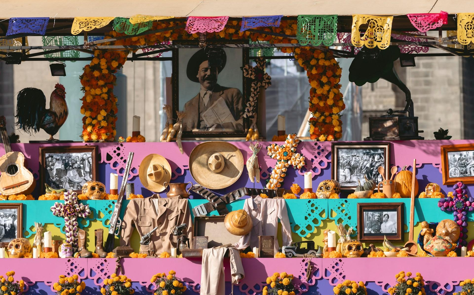 Dia de Muertos decorations at an altar. - The day of the dead