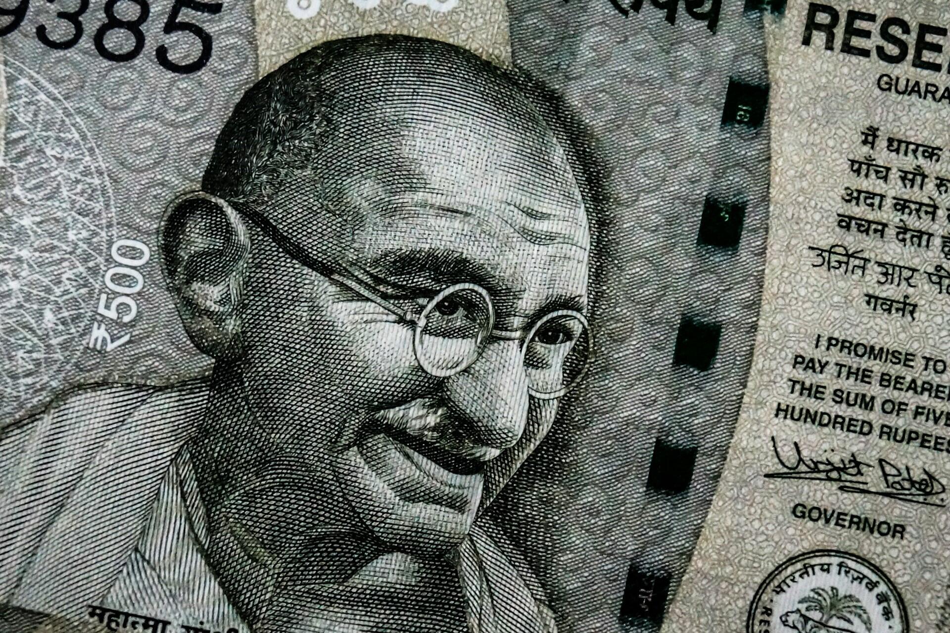Money with Gandhi on it.